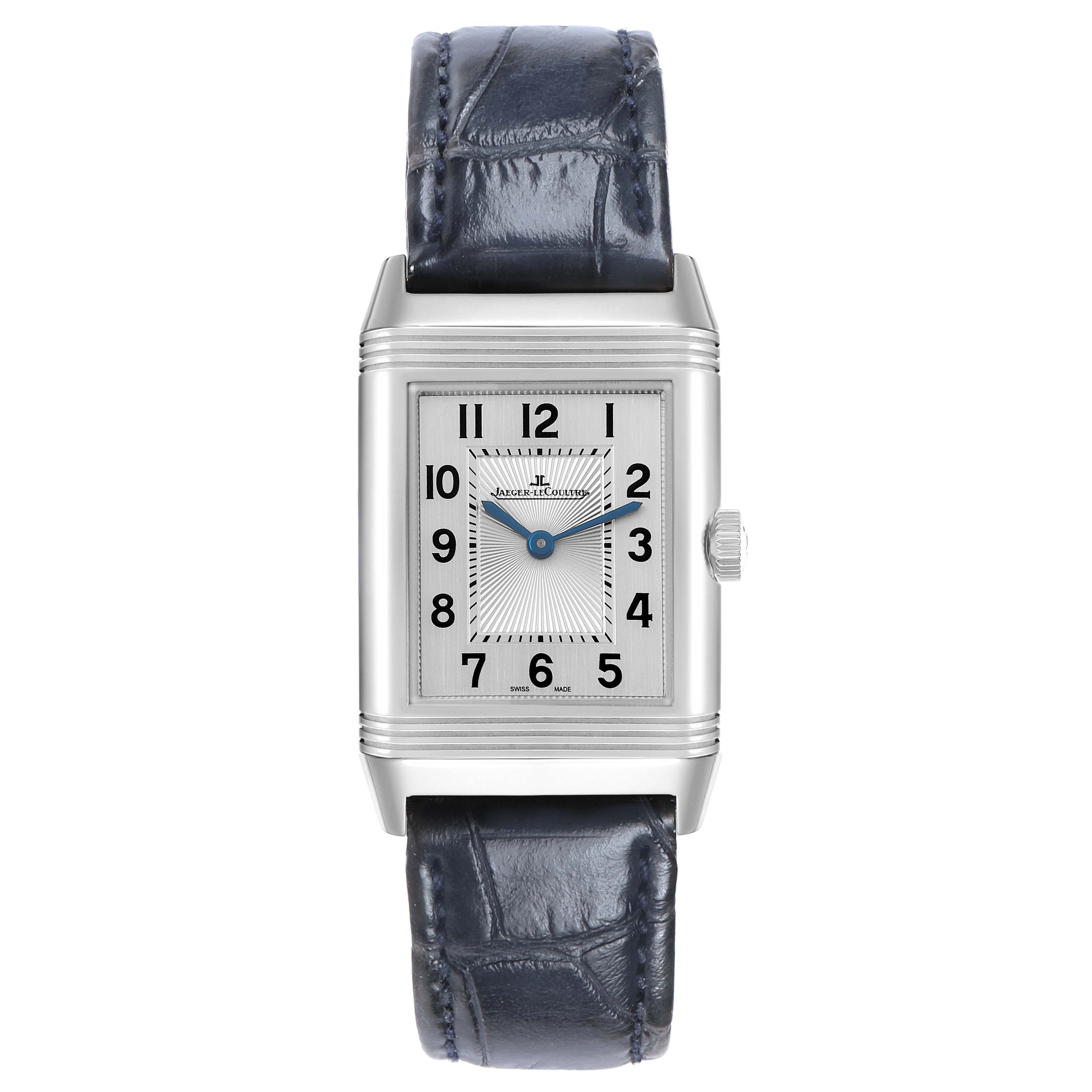The image shows a frontal view of the Jaeger-LeCoultre Reverso watch, highlighting the dial, case, crown, and leather strap.