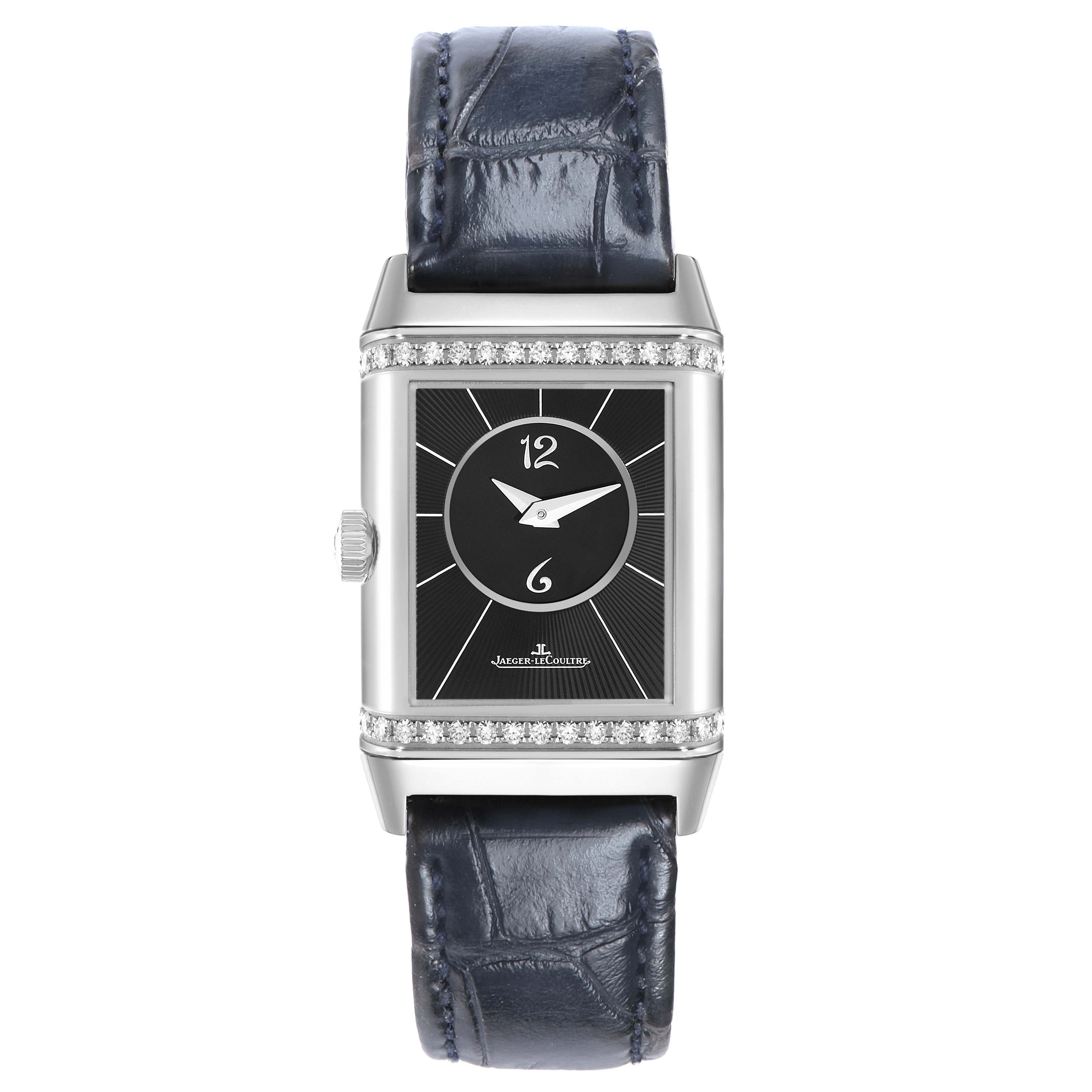 The Jaeger-LeCoultre Reverso watch is shown from a front angle, highlighting its rectangular face and leather strap.