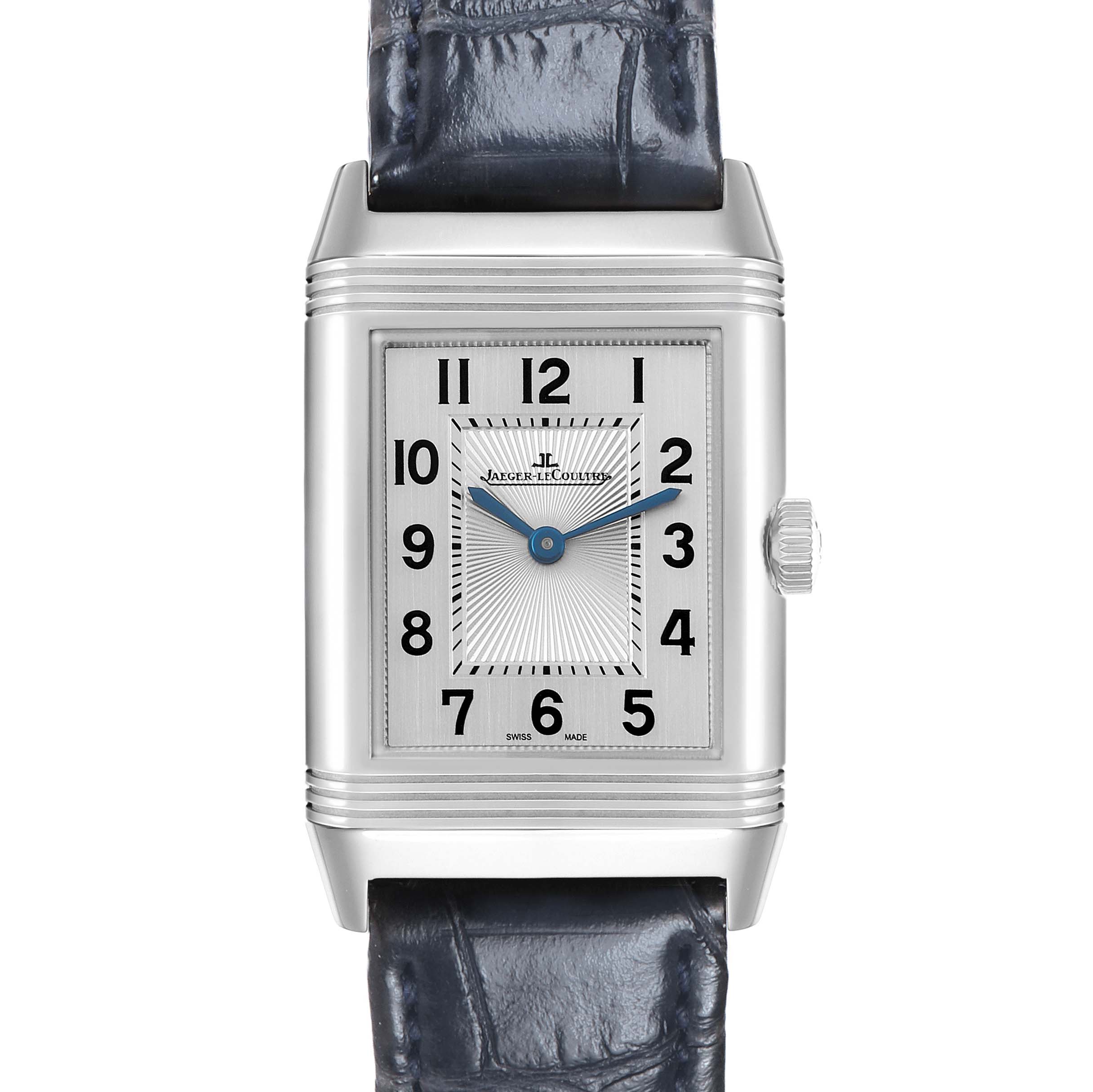 The Jaeger-LeCoultre Reverso watch is shown from the front, displaying its dial, rectangular case, and strap.