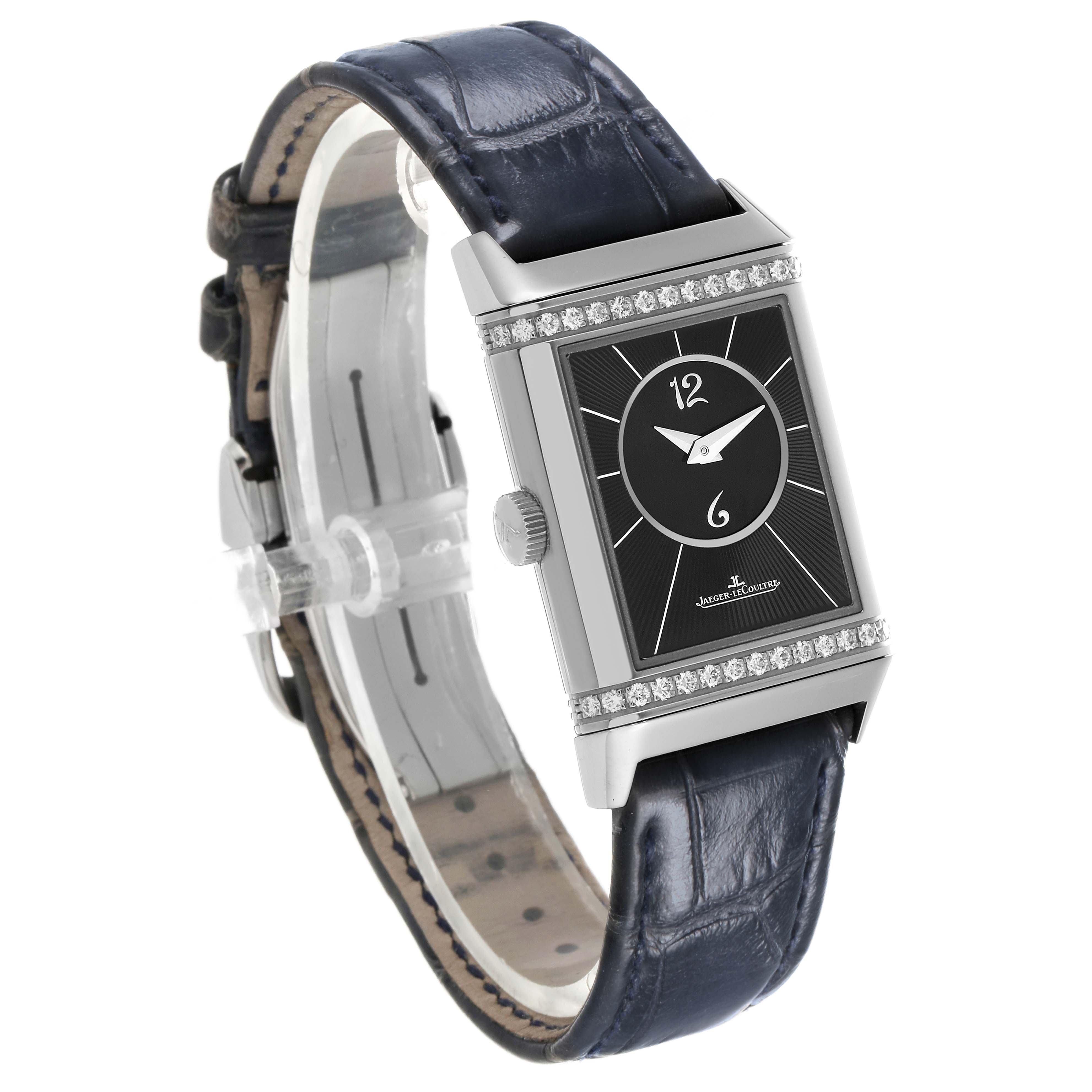The Jaeger LeCoultre Reverso Q2588422 Men's Stainless Steel Silver Dial watch is shown at a slight angle, displaying its rectangular face, crown, and blue leather strap.