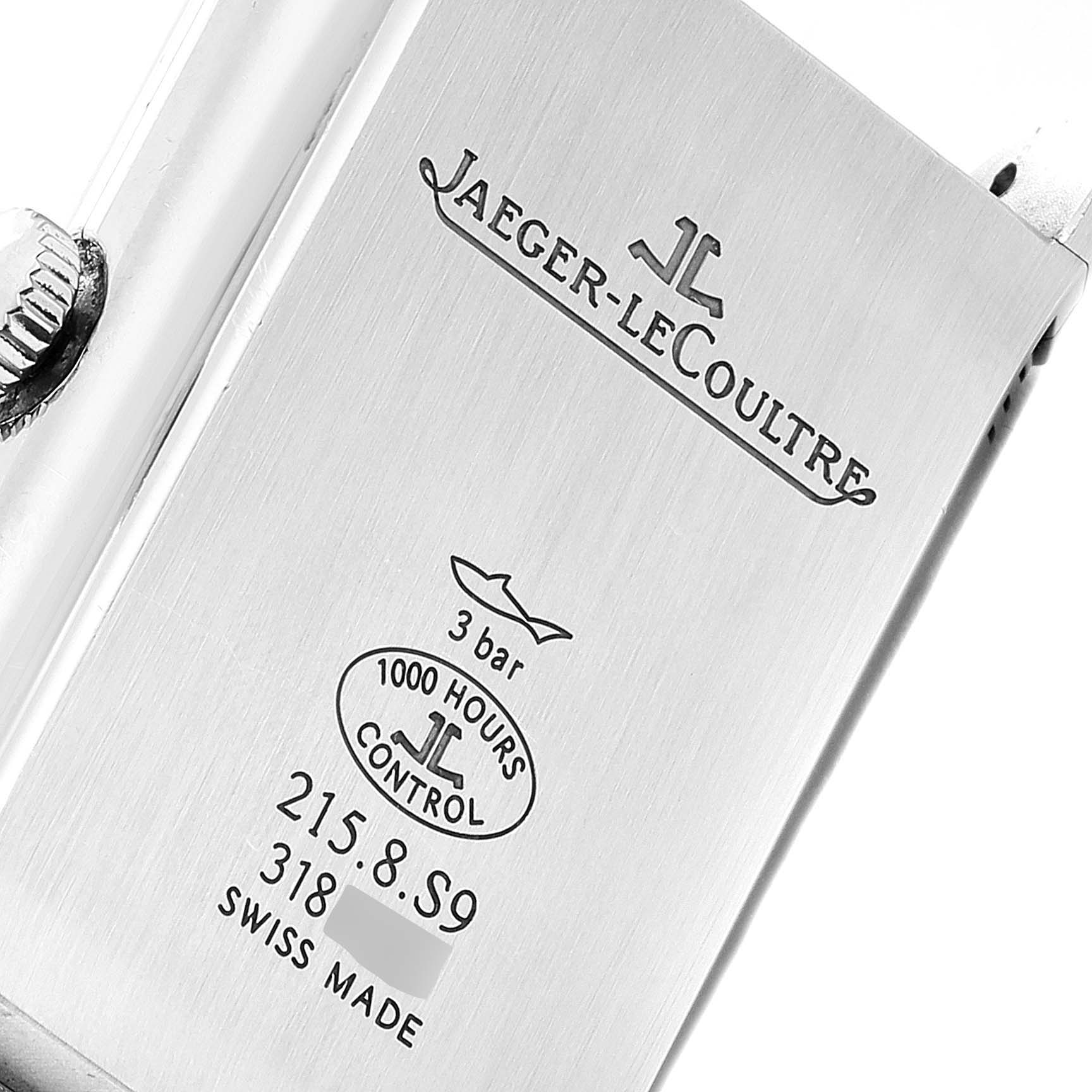 This image shows the case back of the Jaeger-LeCoultre Reverso watch, displaying brand engravings and specifications.