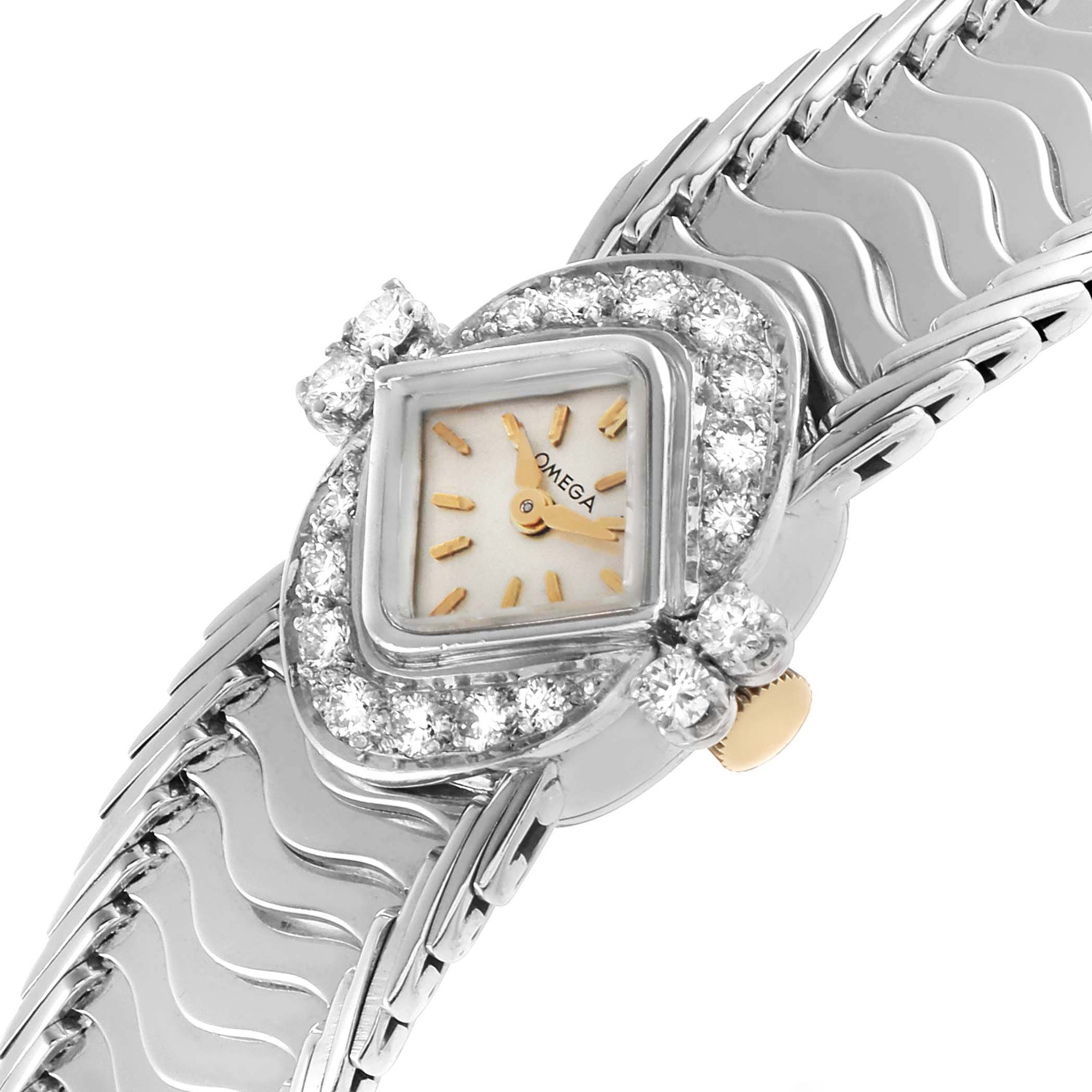 The Omega 119.26.65 Women's Stainless Steel Silver Dial De Ville Vintage Diamond Ladies Watch 119.26.65 is shown at an angle highlighting its diamond bezel and textured bracelet.