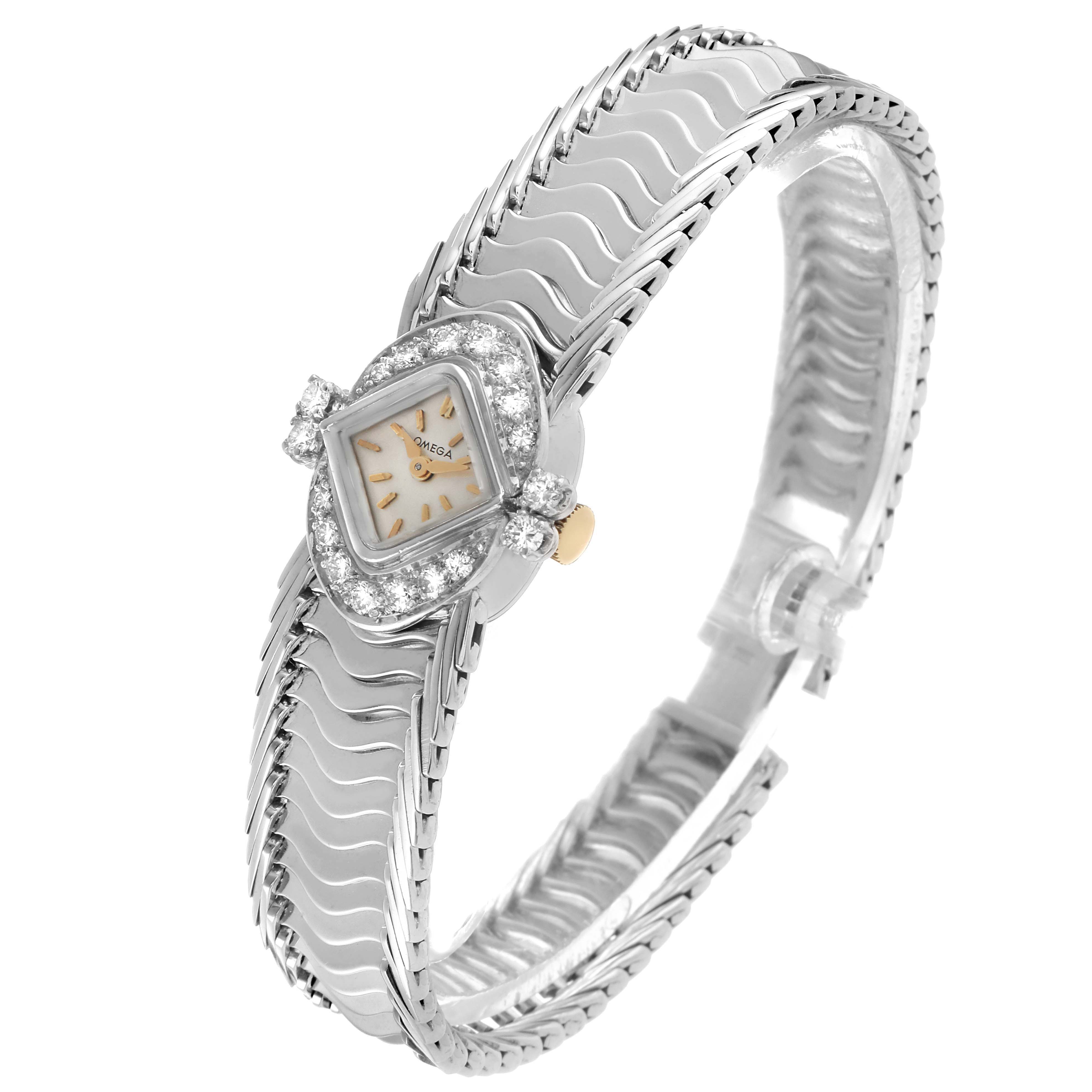 The Omega 119.26.65 Women's Stainless Steel Silver Dial De Ville Vintage Diamond Ladies Watch 119.26.65 is shown at a three-quarter angle, highlighting its ornate diamond bezel and bracelet design.