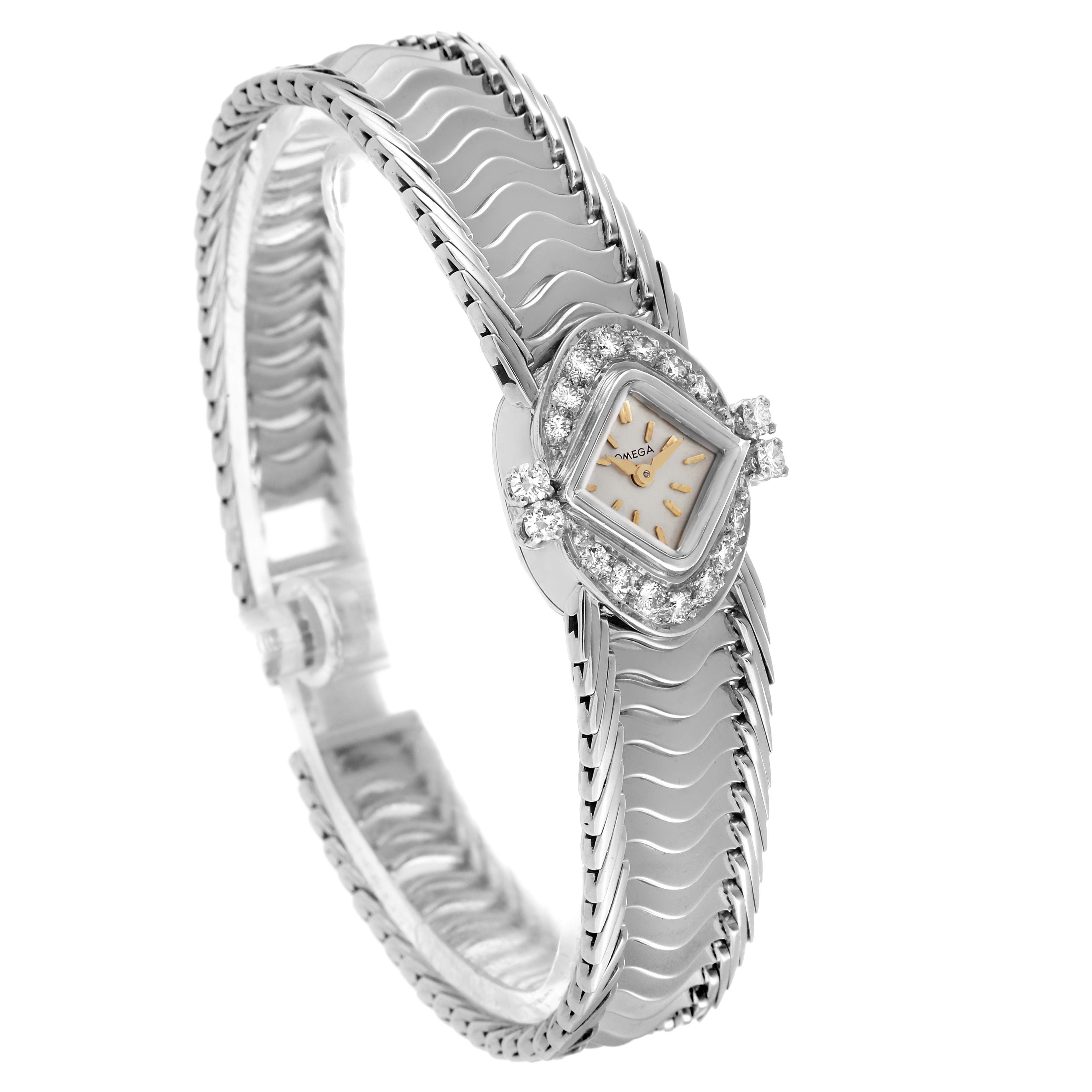 The Omega 119.26.65 Women's Stainless Steel Silver Dial De Ville Vintage Diamond Ladies Watch 119.26.65 is shown at an angled view, highlighting its diamond-adorned bezel and metallic bracelet.