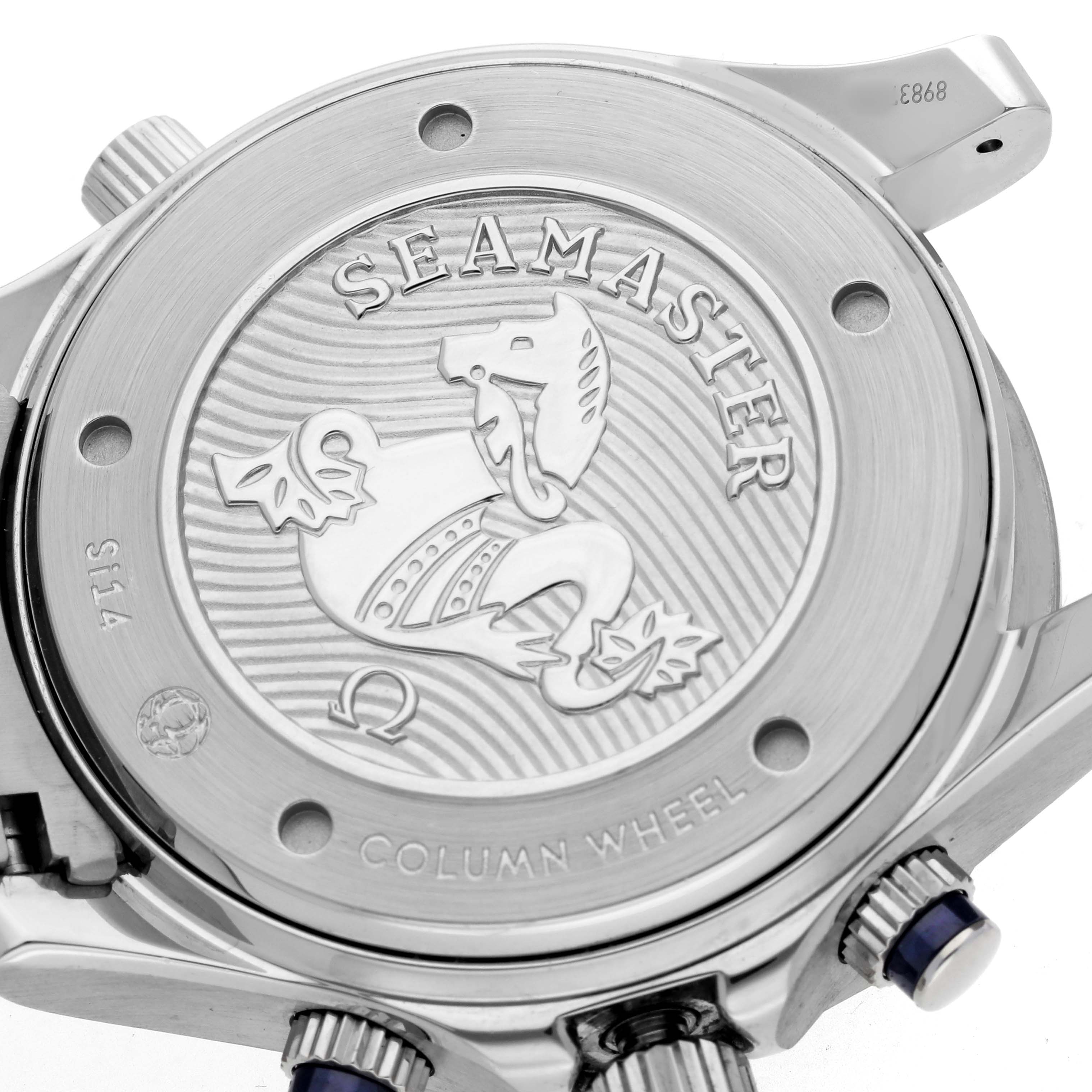 The image shows the back of an Omega Seamaster 212.30.44.50.03.001 Men's Stainless Steel Blue Dial watch, highlighting its engraved case back and pushers.