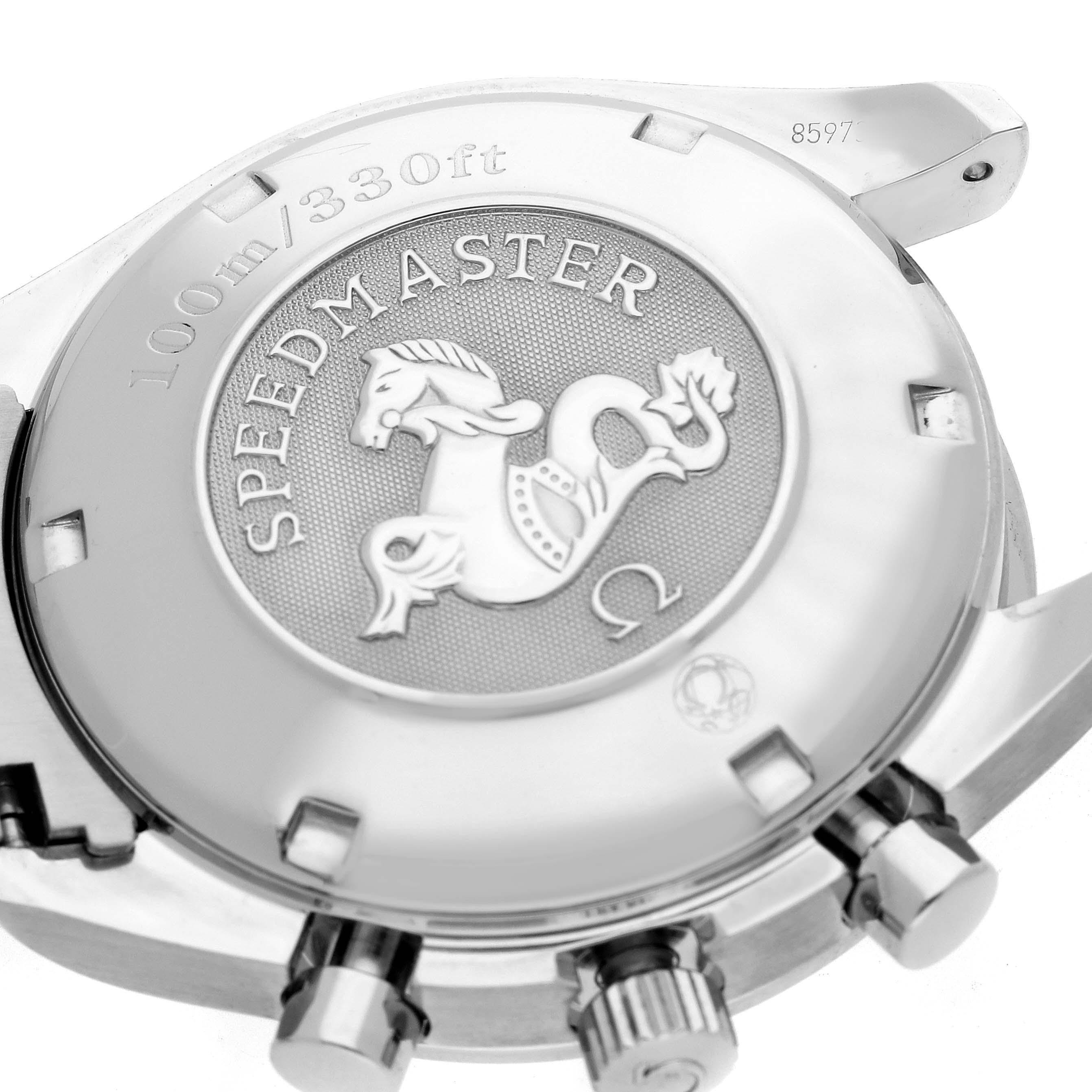 The image shows the case back of the Omega Speedmaster 3210.52.00 Men's Stainless Steel Black Dial watch, highlighting its emblem and features.