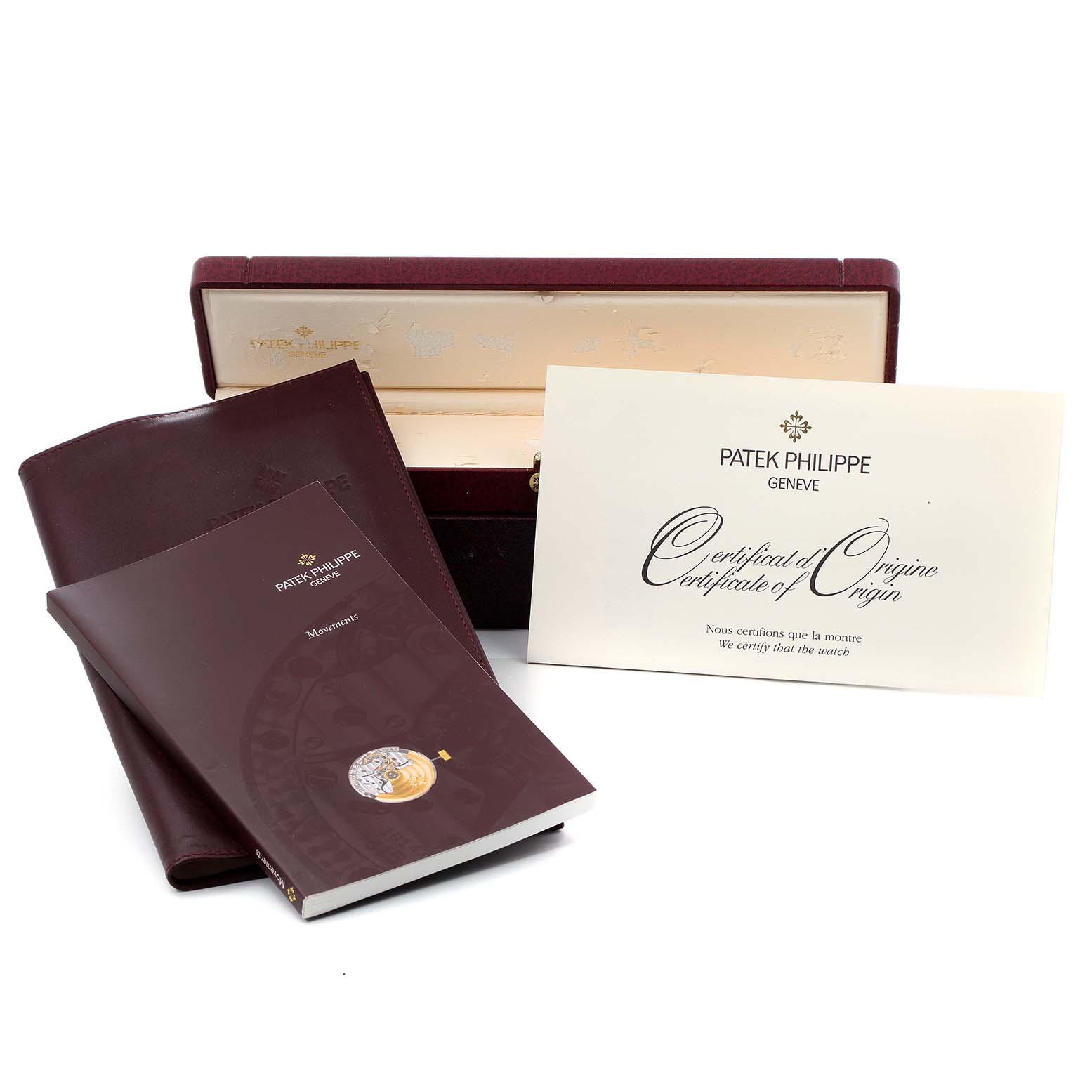 The image shows the packaging, certificate, and booklet for the Patek Philippe Calatrava 5022R Men's Rose Gold Pink Dial 5022R Men's Rose Gold Pink Dial watch.
