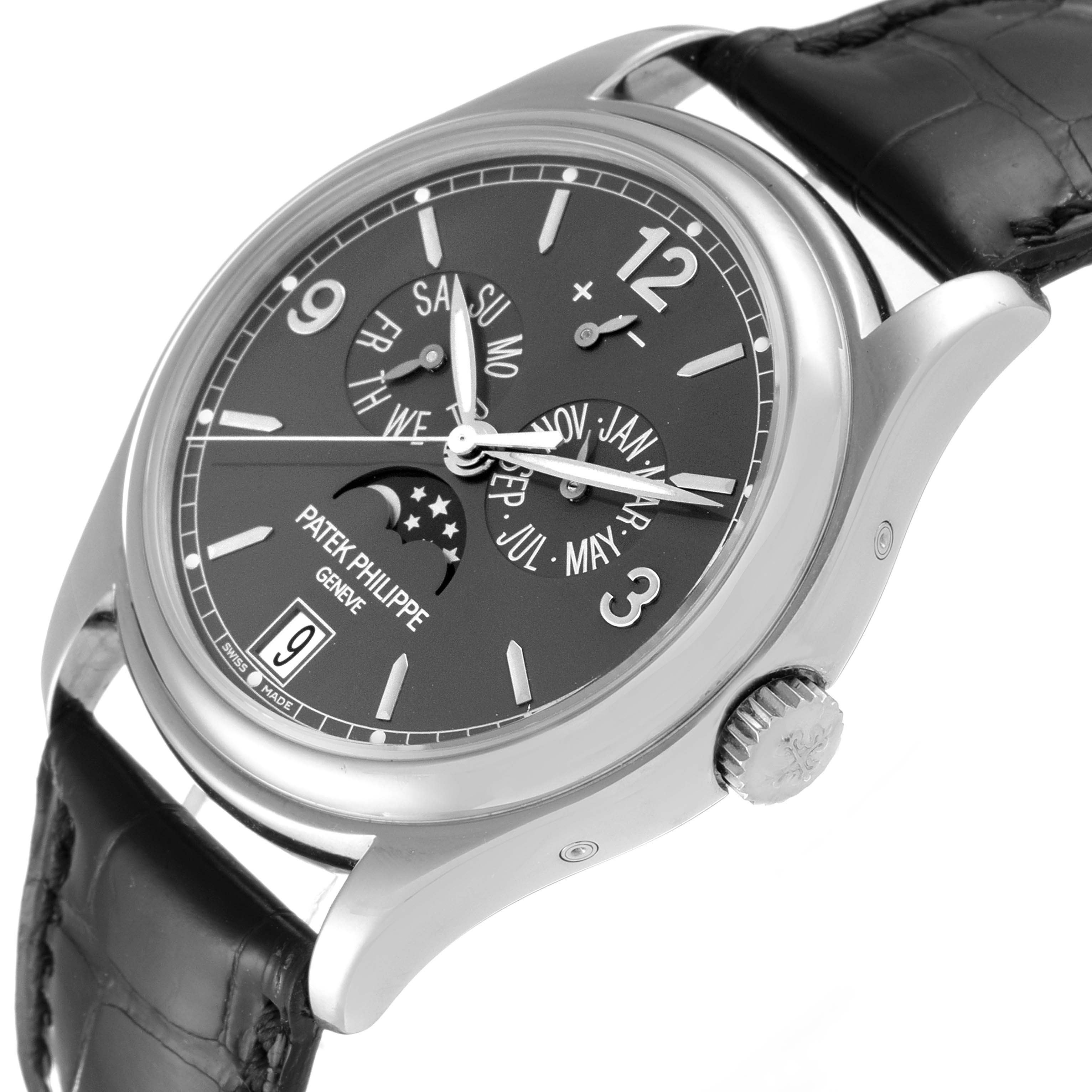 The Patek Philippe 5146G Men's White Gold Grey Dial 5146G Men's White Gold Grey Dial Complicated Annual Calendar White Gold Mens Watch 5146 is shown at a tilted angle emphasizing the dial, crown, and leather strap.