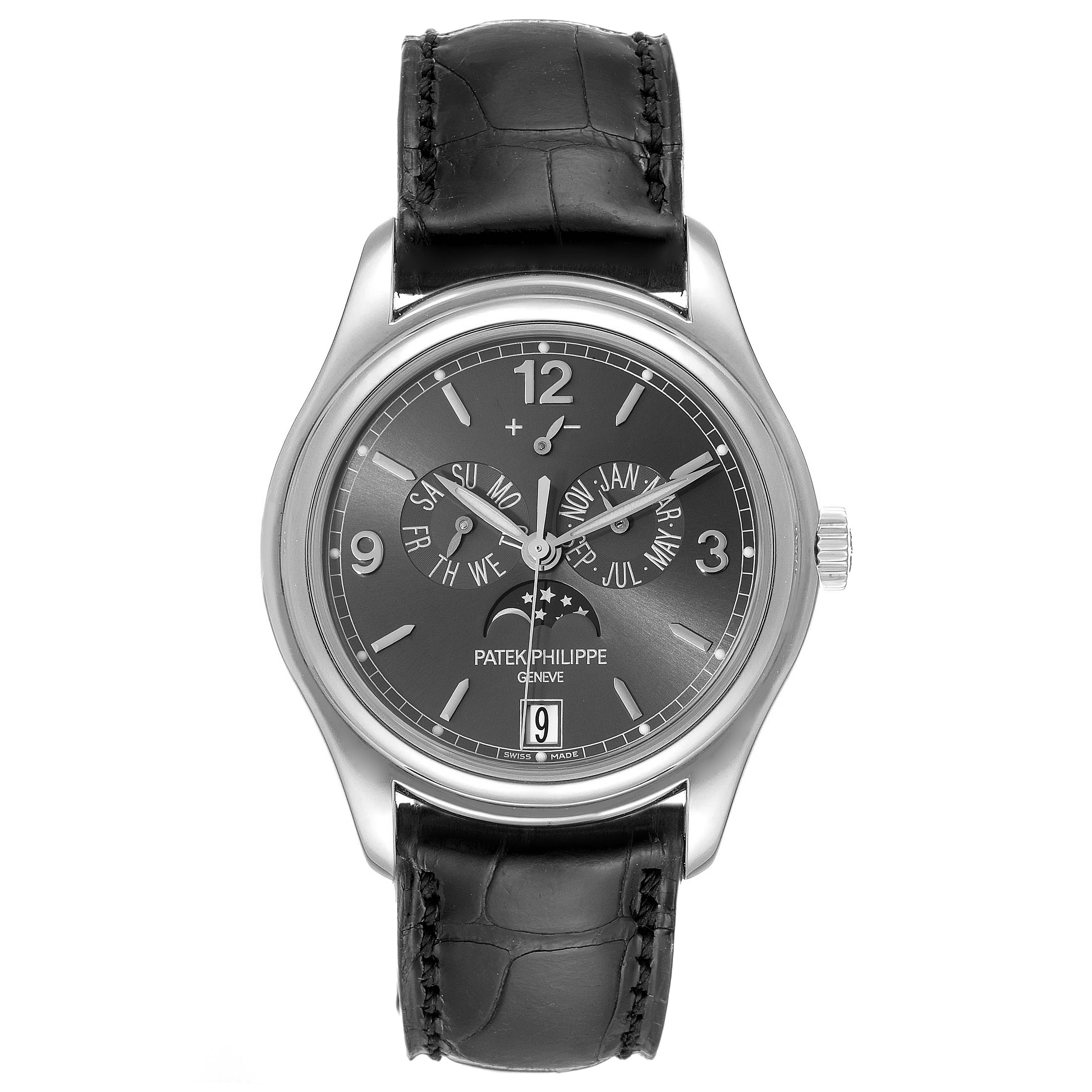 The image shows a front view of the Patek Philippe 5146G Men's White Gold Grey Dial 5146G Men's White Gold Grey Dial Complicated Annual Calendar White Gold Men's Watch 5146, showcasing its face and black strap.
