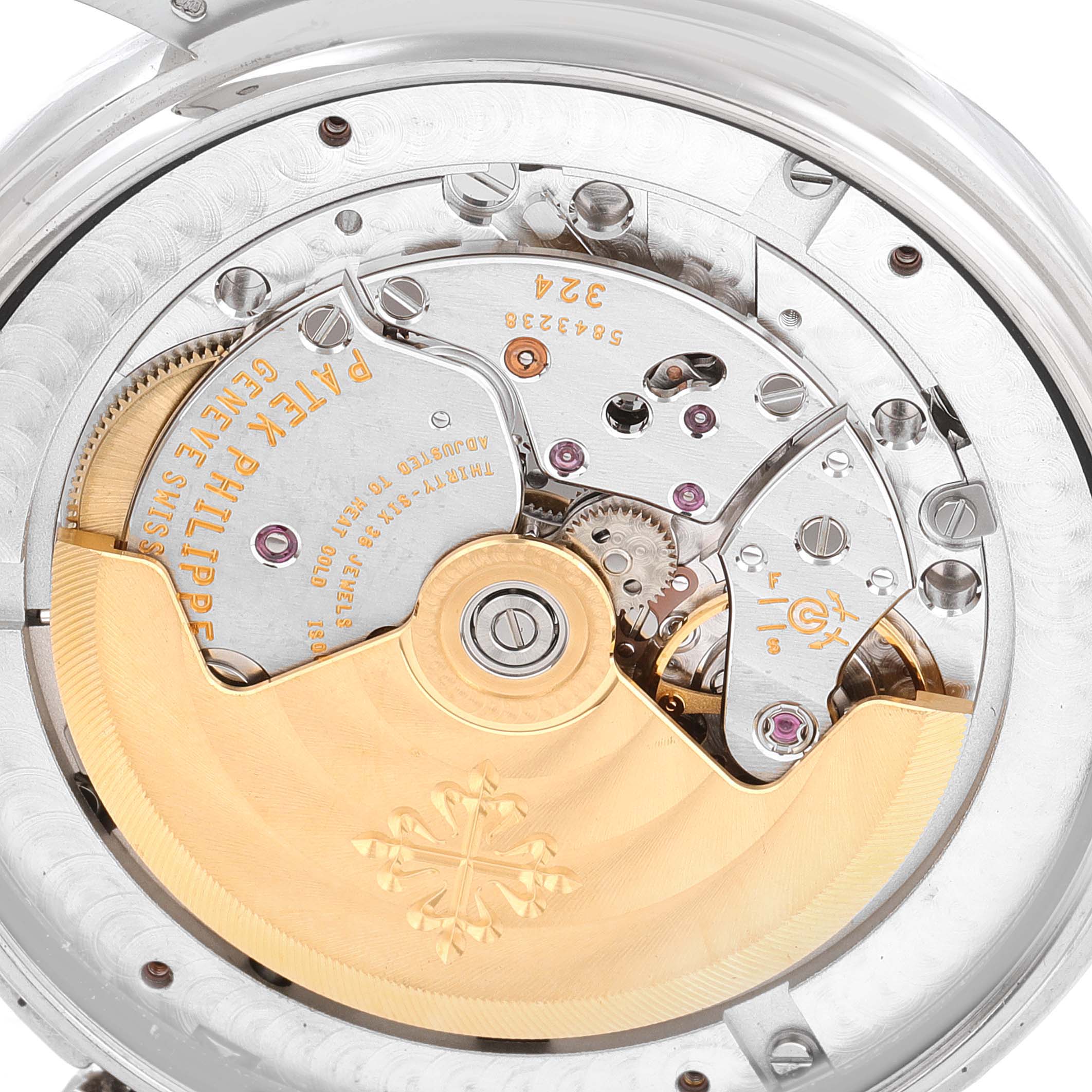 The image shows the intricate movement components of a Patek Philippe 5146G Men's White Gold Grey Dial 5146G Men's White Gold Grey Dial 5146 Complicated Annual Calendar White Gold Men's Watch from the back angle.