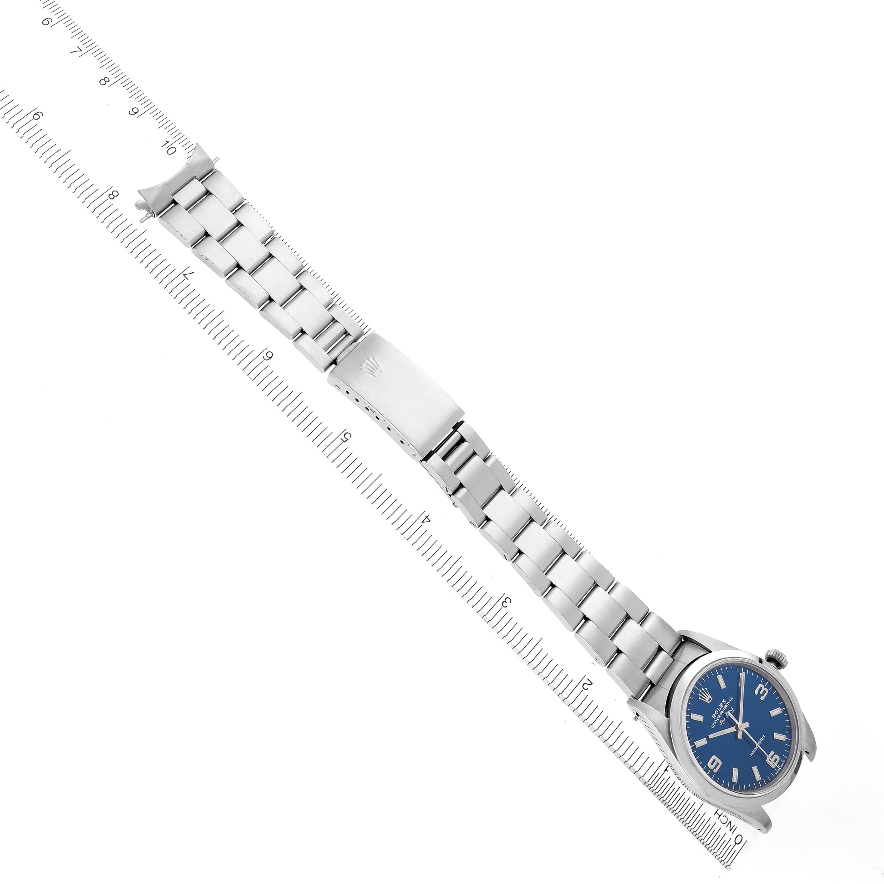 The Rolex Air-King 14000 Men's Stainless Steel Blue Dial 14000 Men's Stainless Steel Blue Dial watch is shown at an angle displaying the full bracelet and clasp, along with the dial.
