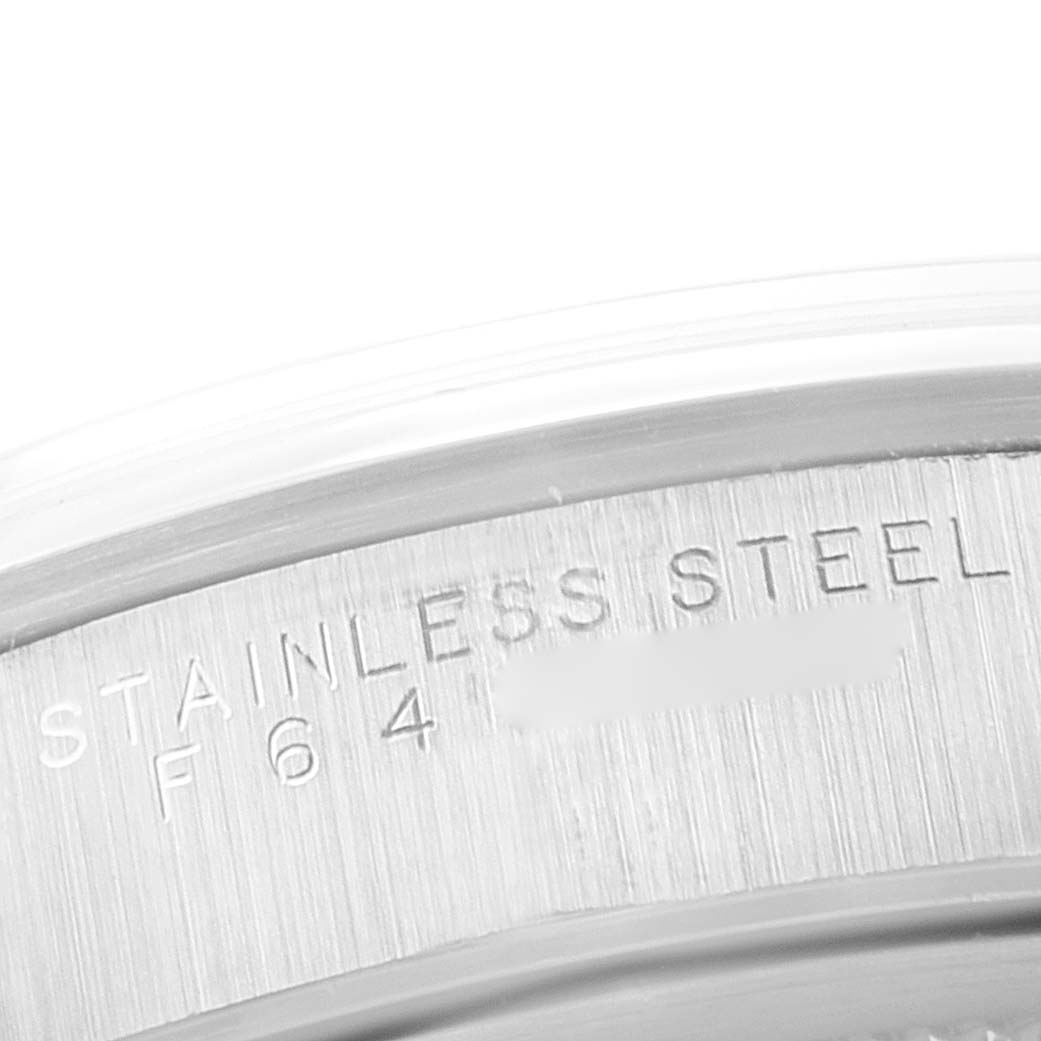 This image shows a close-up of the stainless steel case back of a Rolex Air-King 14000 Men's Stainless Steel Silver Dial 14000 Men's Stainless Steel Silver Dial watch, highlighting the engraved text.
