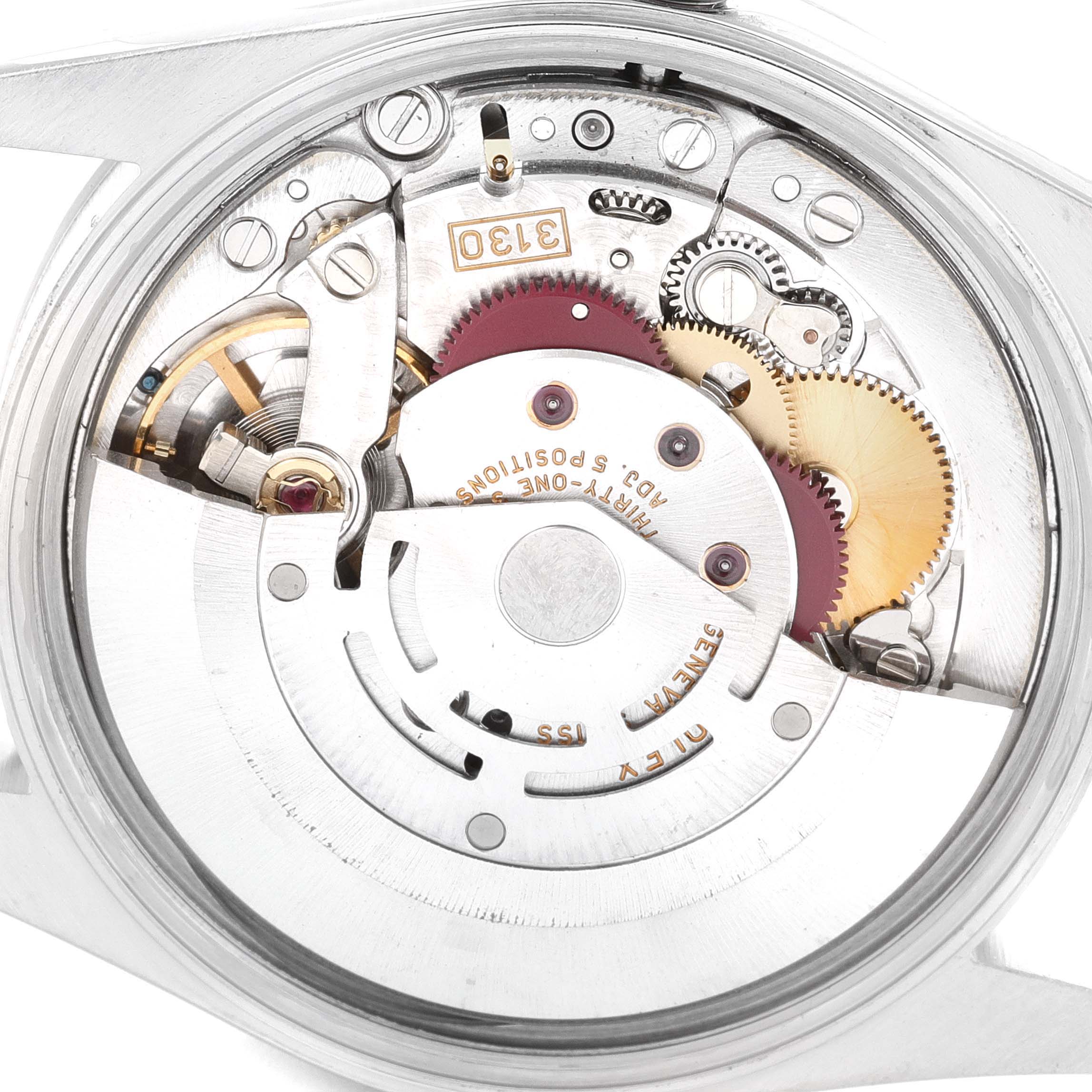 This image shows the back view of the inner mechanism of a Rolex Air-King 14000 Men's Stainless Steel Silver Dial 14000 Men's Stainless Steel Silver Dial watch, highlighting the gears and movement components.