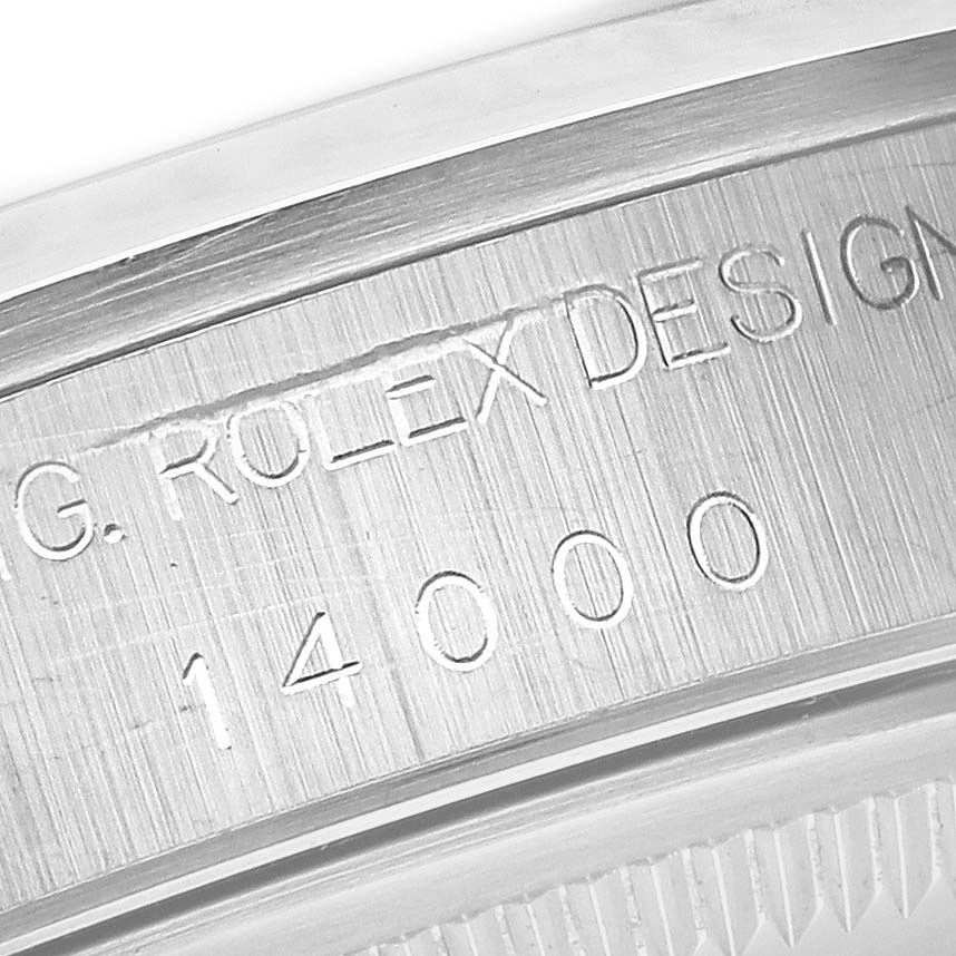 The image shows a close-up of the engraved inner bezel of the Rolex Air-King 14000 Men's Stainless Steel Silver Dial 14000 Men's Stainless Steel Silver Dial watch.