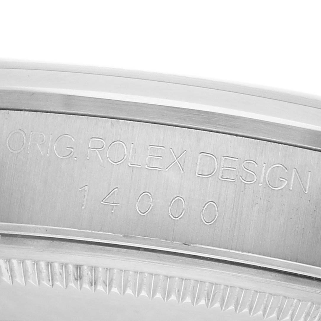 The image shows a close-up of the Rolex Air-King 14000 Men's Stainless Steel Pink Dial case side, highlighting the engraved design number "14000."