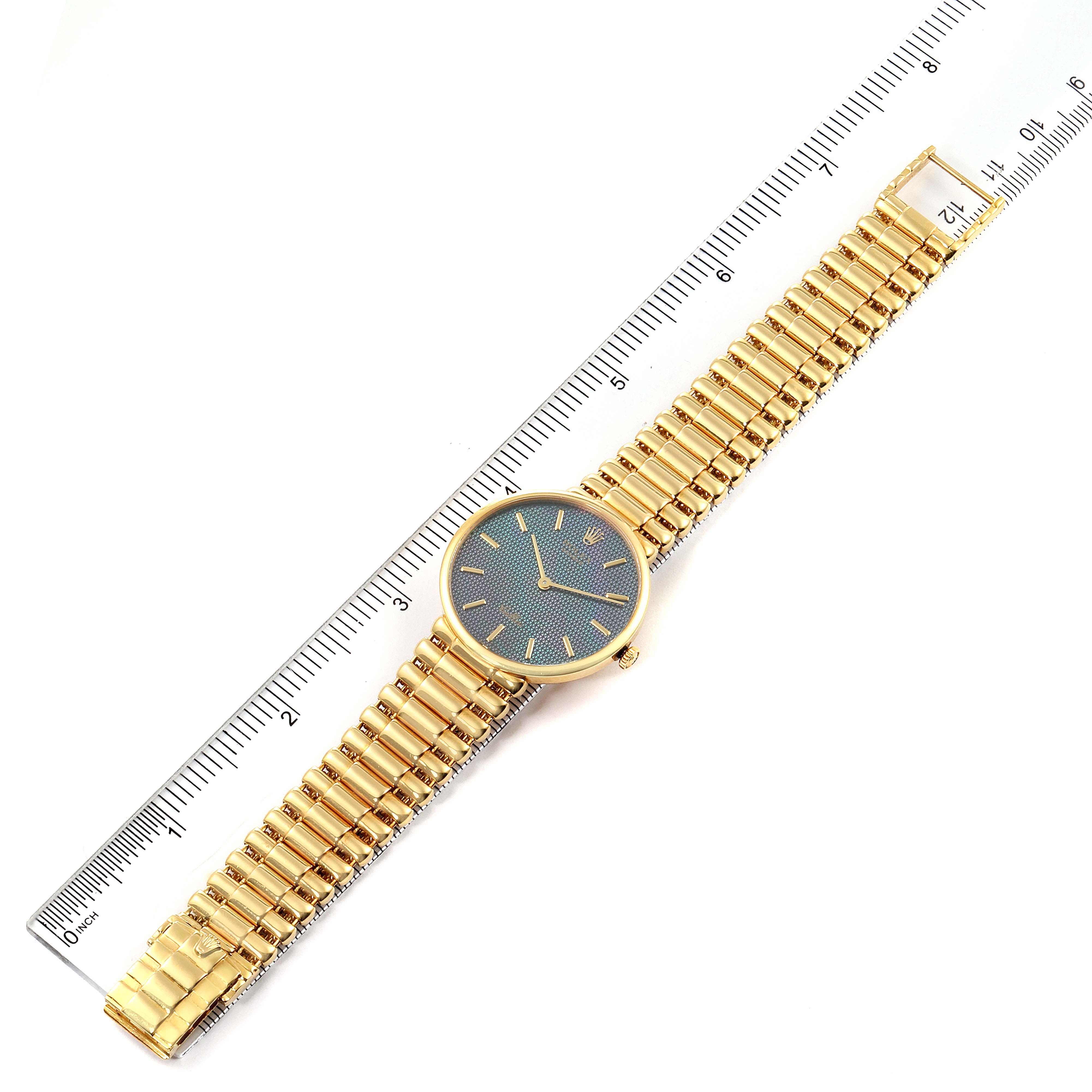 This image shows the Rolex Cellini 5162 Men
s Yellow Gold Mother of Pearl Dial 5162 Men
s Yellow Gold Mother of Pearl Dial watch laying flat, with both the watch face and gold bracelet fully visible.