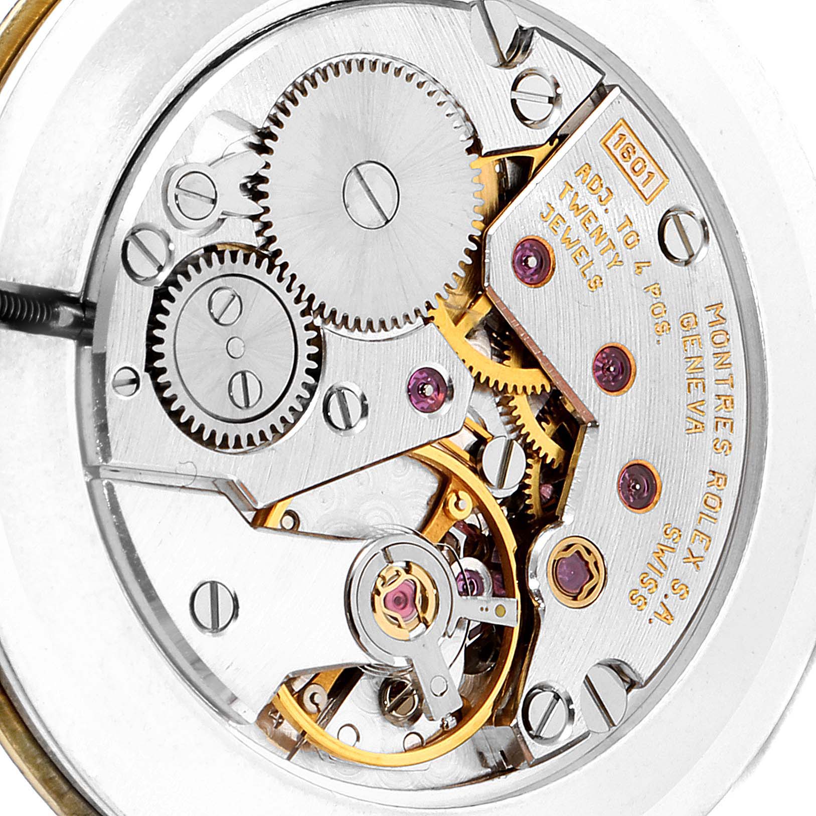 The image shows the intricate internal movement mechanism of the Rolex Cellini 5162 Men
s Yellow Gold Mother of Pearl Dial 5162 Men
s Yellow Gold Mother of Pearl Dial watch from a close-up angle.