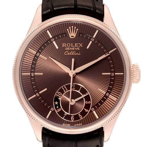 The Rolex Cellini watch is shown from a front angle, highlighting its dial and case details.