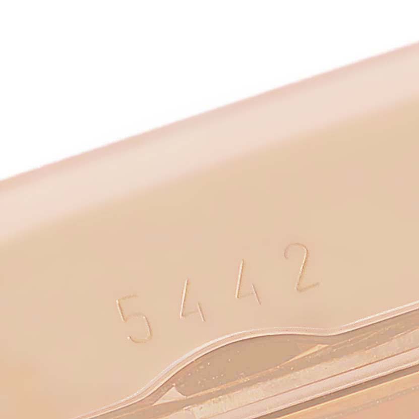 This image shows a close-up of the engraving on the back of a Rolex Cellini 5442 Men's Rose Gold Black Dial 5442 Men's Rose Gold Black Dial model watch.