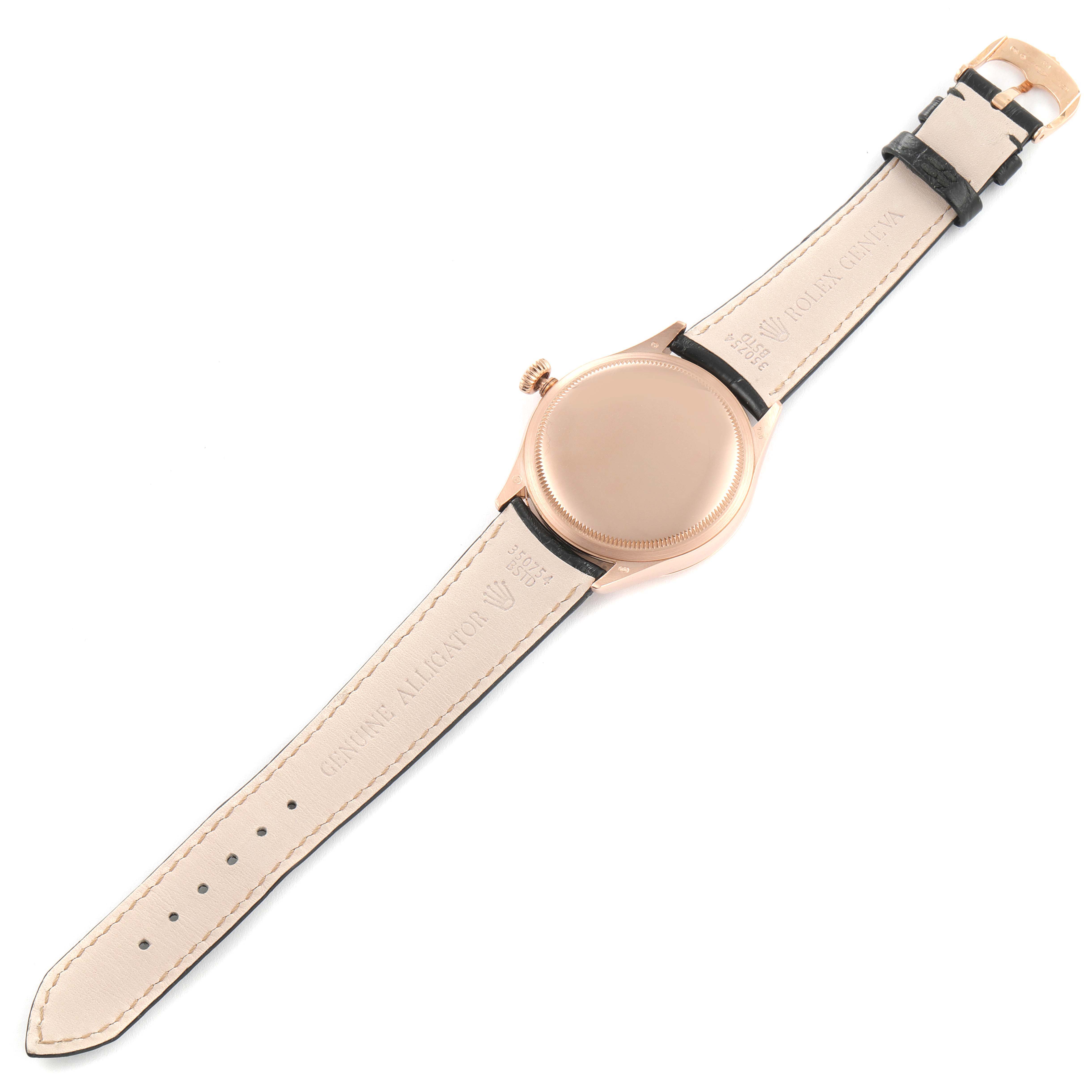 The image shows the backside and strap of a Rolex Cellini 50505 Men
s Rose Gold White Dial 50505 Men
s Rose Gold White Dial watch from a top-down angle.