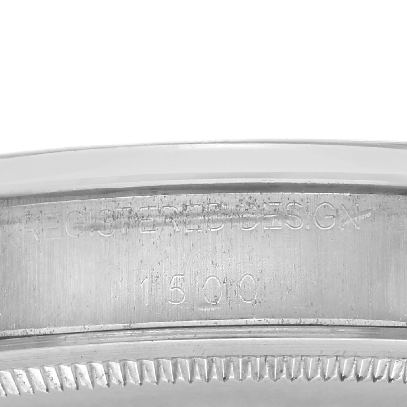 The image shows the side engraving on the case of a Rolex Date 1500 Men
s Stainless Steel Black Dial 1500 Men
s Stainless Steel Black Dial model watch.