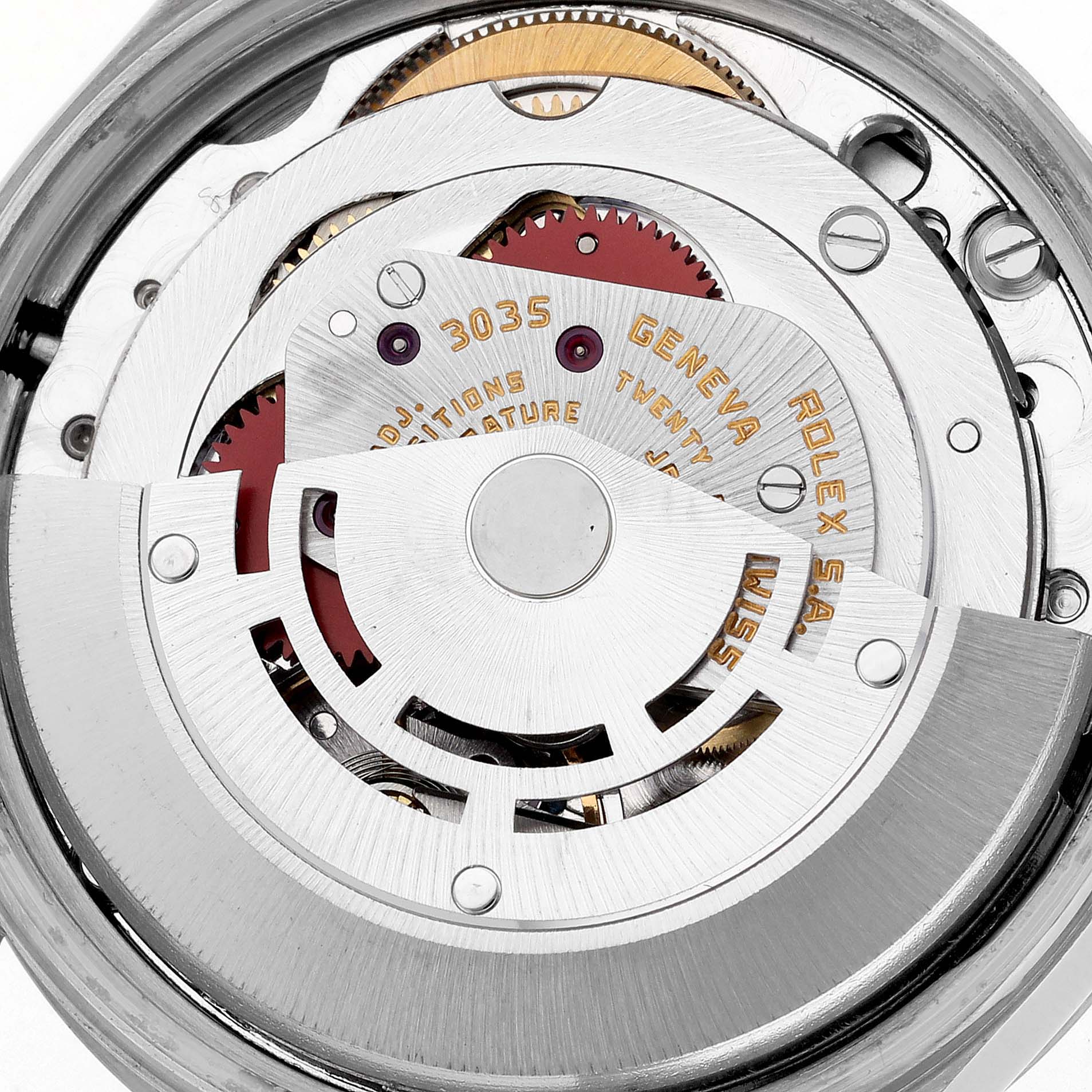 The image shows a close-up of the Rolex Date 15000 Men's Stainless Steel Silver Dial 15000 Men's Stainless Steel Silver Dial model's movement from the back, highlighting gears and engravings.