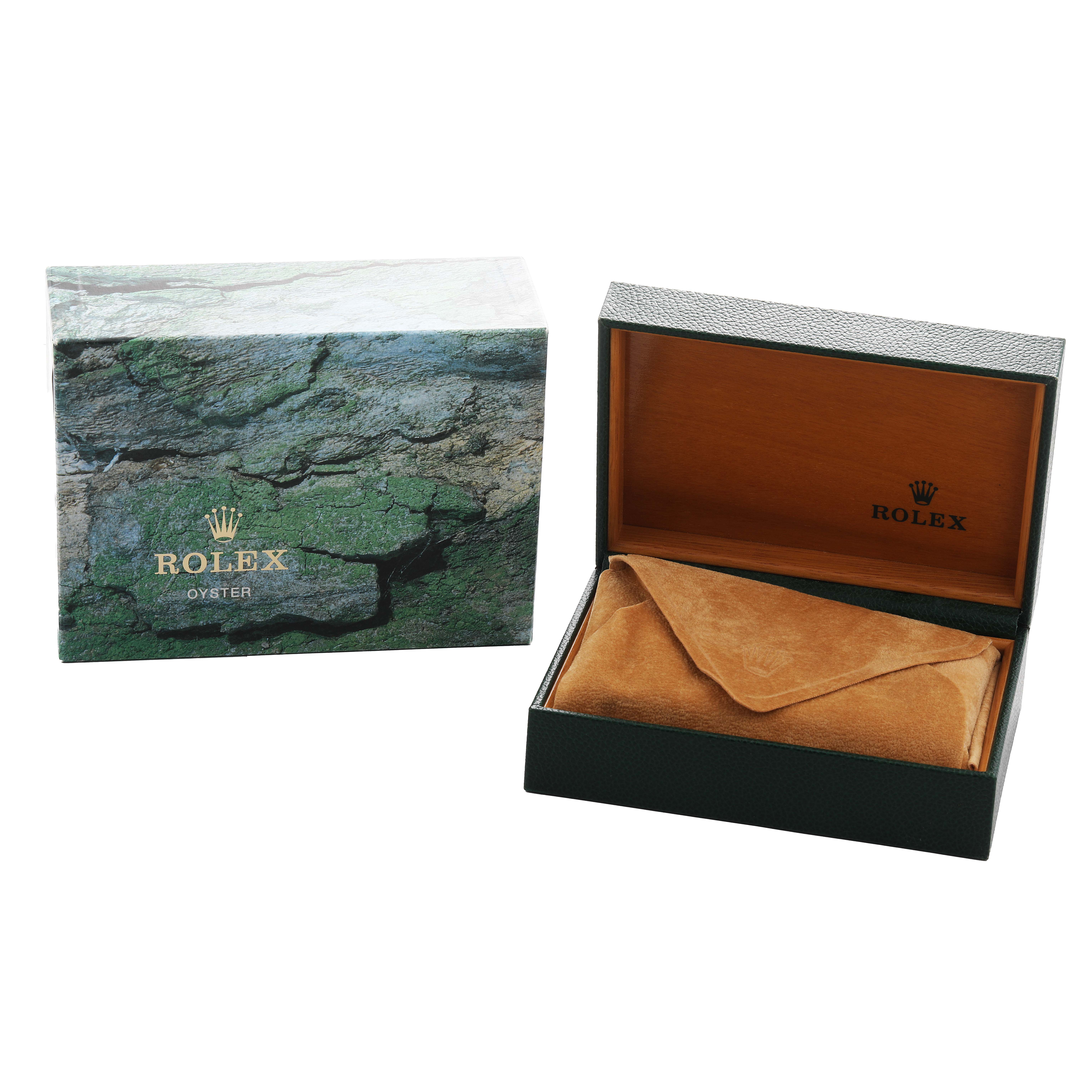 The image shows a Rolex Date 15200 Men's Stainless Steel Pink Dial model watch box and outer packaging from a front angle, with an open interior and suede pouch.