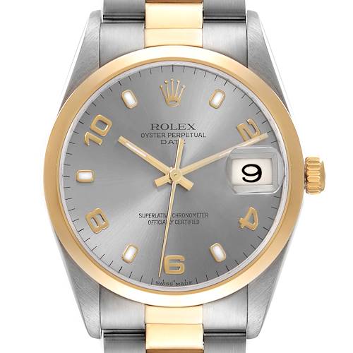 The Rolex Date is shown from the front, displaying the dial, bezel, crown, and part of the bracelet.