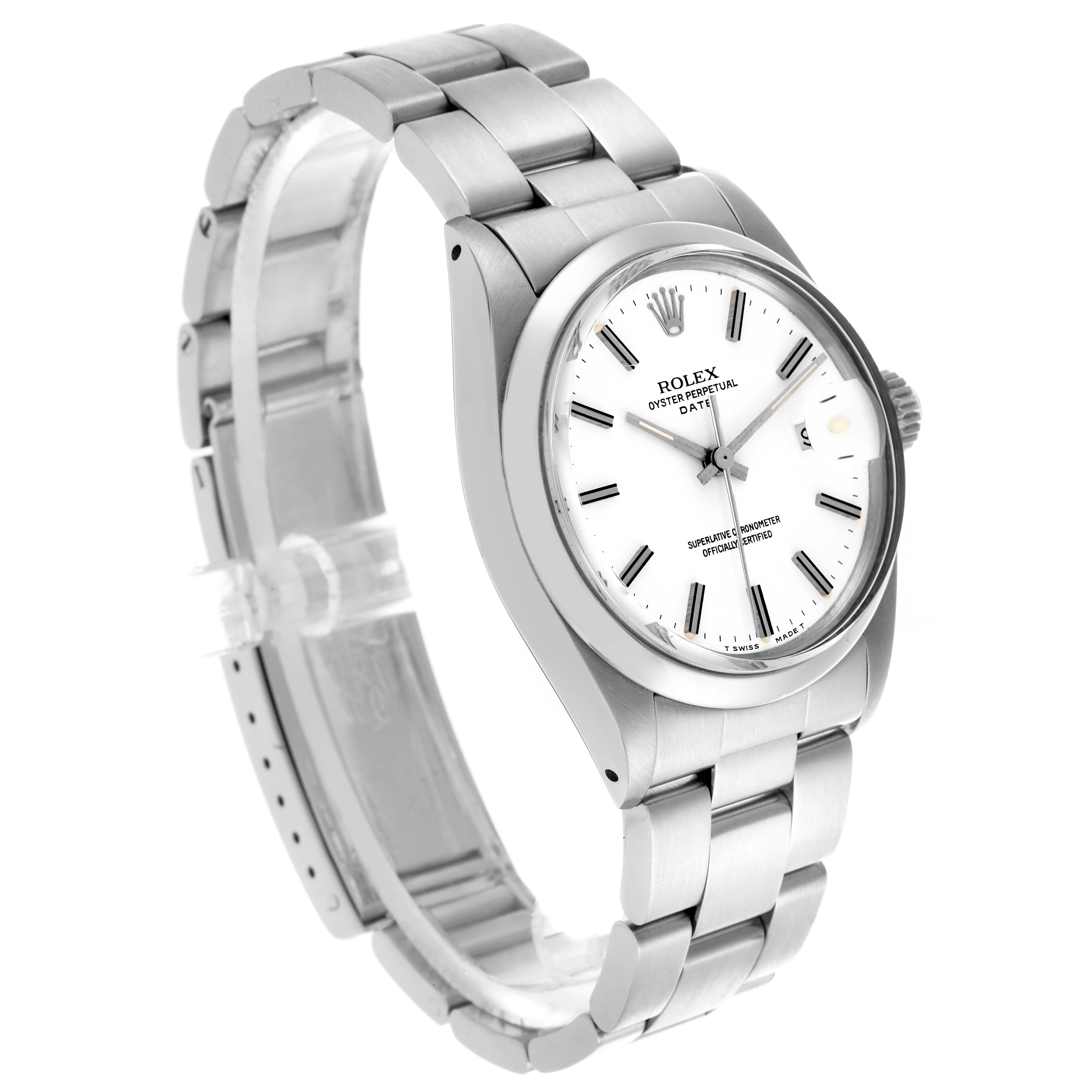 The Rolex Date 66579 Men's Stainless Steel White Dial 66579 Men's Stainless Steel White Dial watch is shown at an angle displaying the face, bezel, crown, and bracelet.