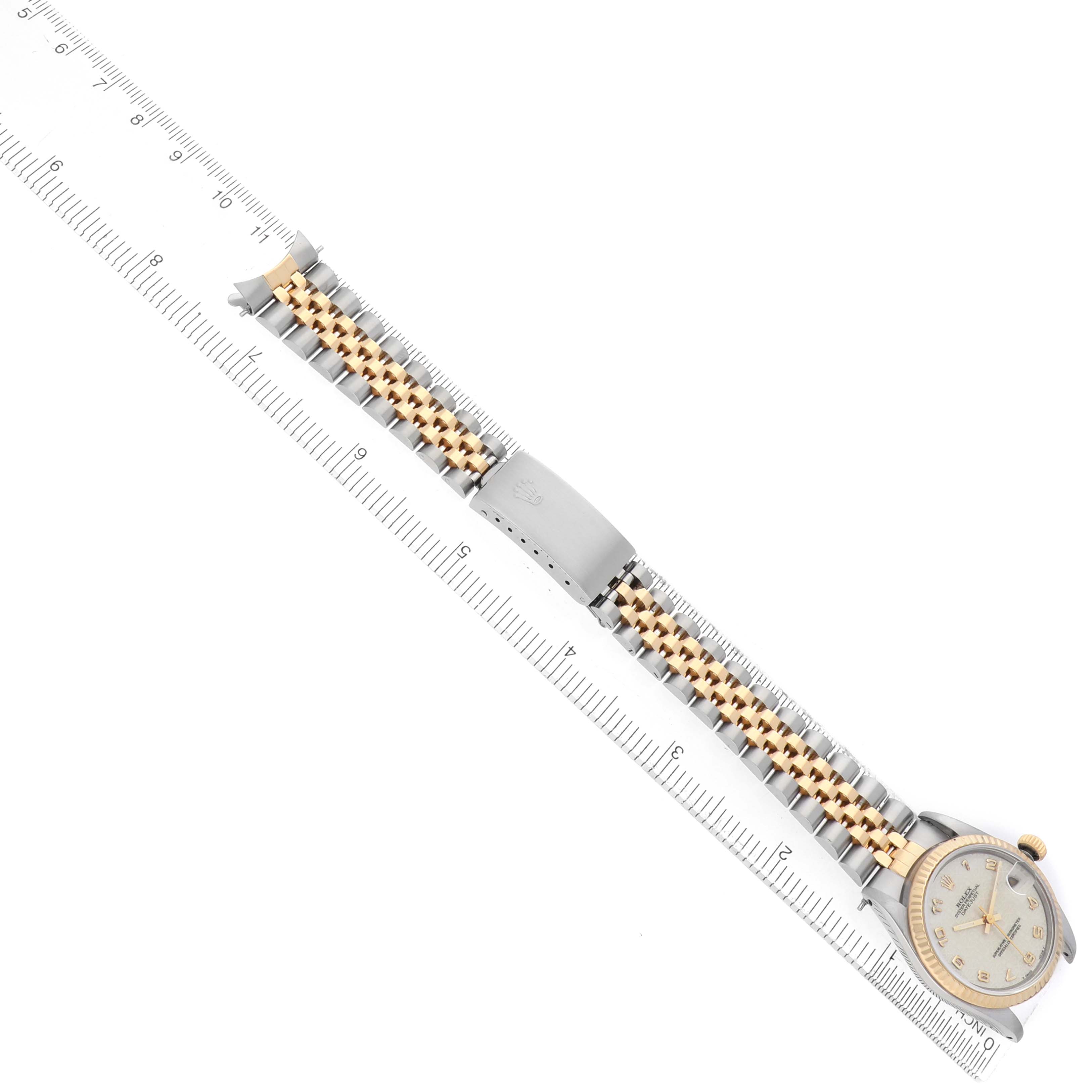 The Rolex Mid-Size 68273 Women's Steel and Gold (two tone) Champagne Dial watch is shown at an overhead angle, displaying the full bracelet, clasp, and face.