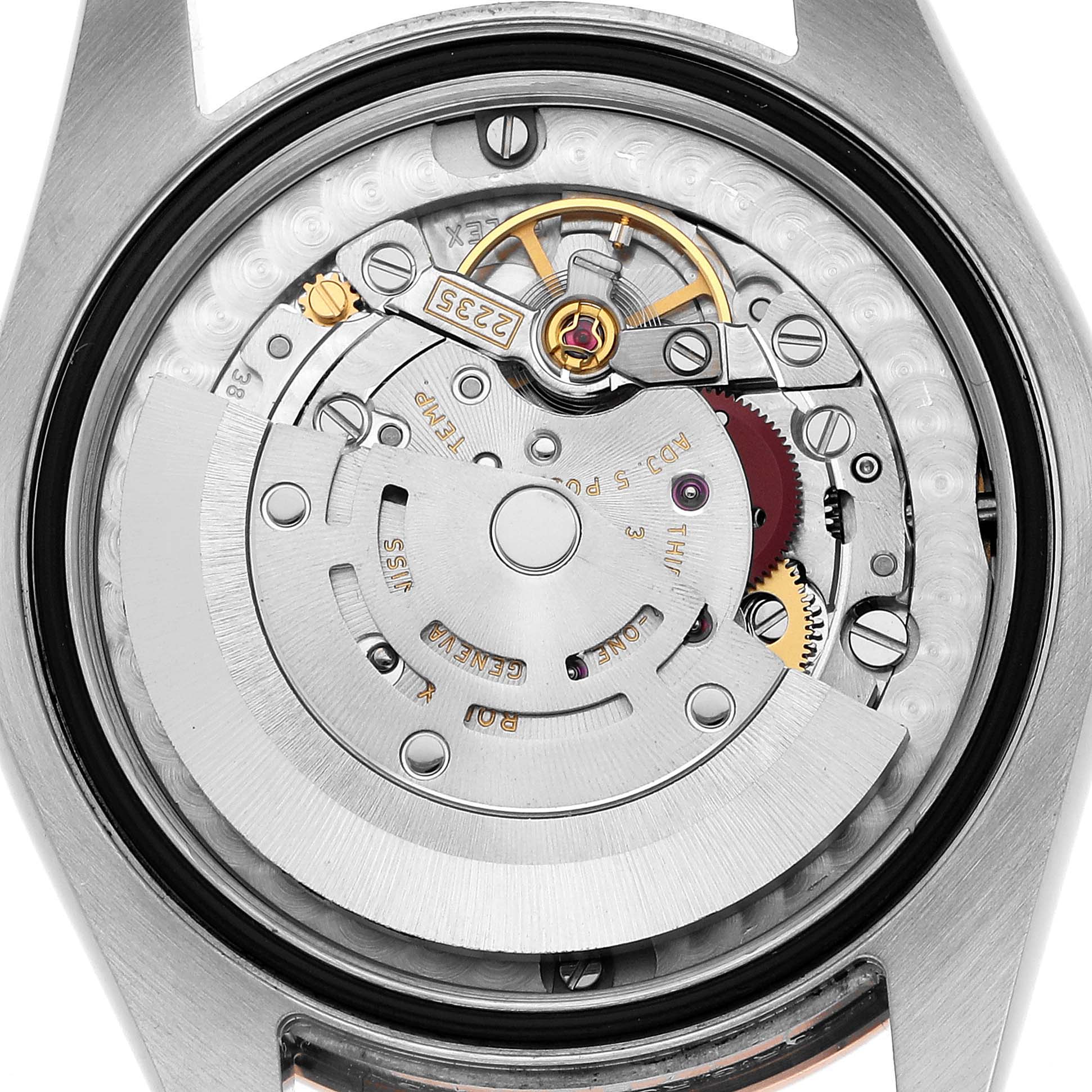 The image shows the inner mechanism of a Rolex Mid-Size 178341 Women's Steel and Gold (two tone) Brown Dial model, focusing on the movement components from a top-down angle.