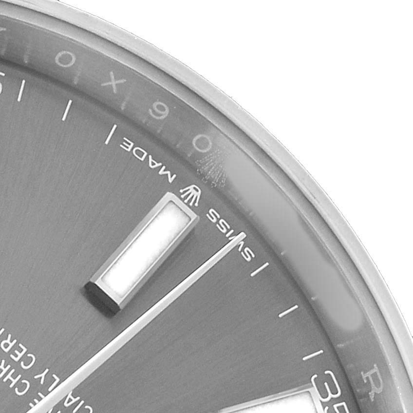 The image shows a close-up of the Rolex Datejust 41 126334 Men's Stainless Steel Grey Dial dial, focusing on the indices and the "SWISS MADE" text at an angle.