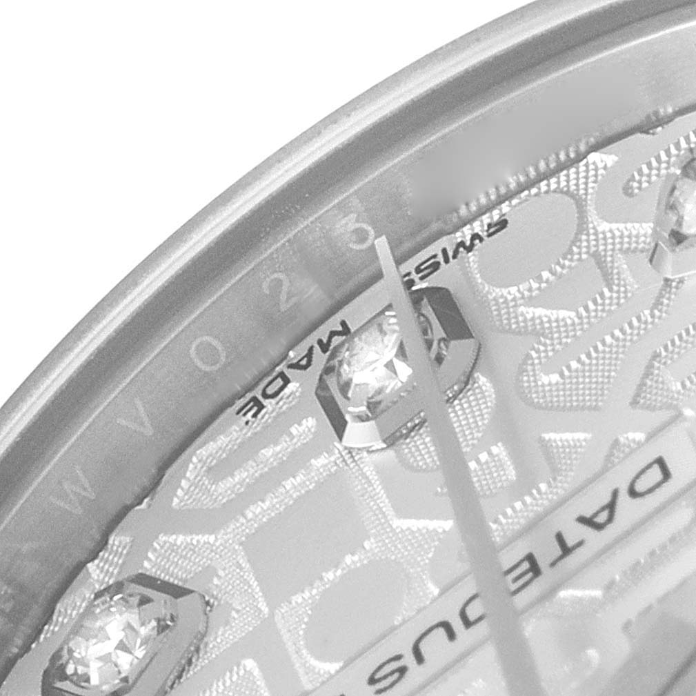 The image shows a close-up of the dial, diamonds, and part of the minute hand of a Rolex Mid-Size 178274 Women
s Stainless Steel Silver Dial 178274 Women
s Stainless Steel Silver Dial Datejust watch.