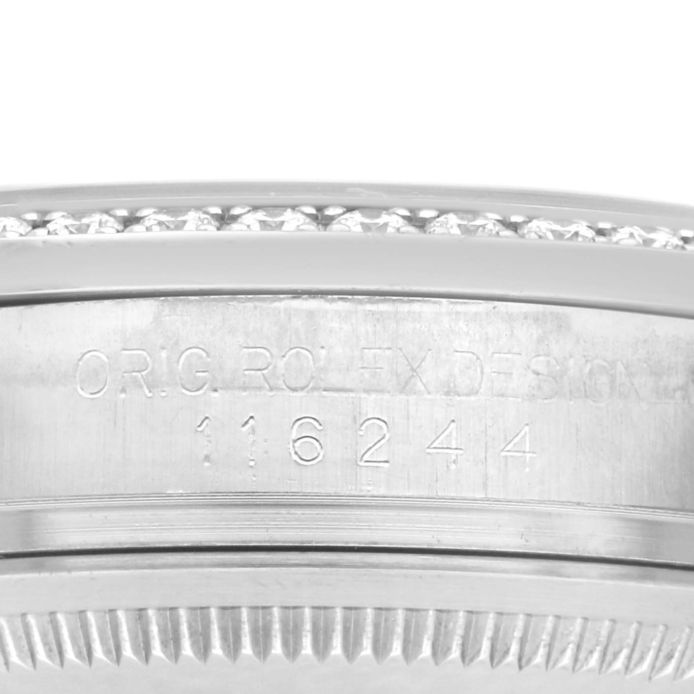 The image shows the engraved side and part of the bezel of a Rolex Datejust 116244 Men
s Stainless Steel Silver Dial 116244 Men
s Stainless Steel Silver Dial watch.