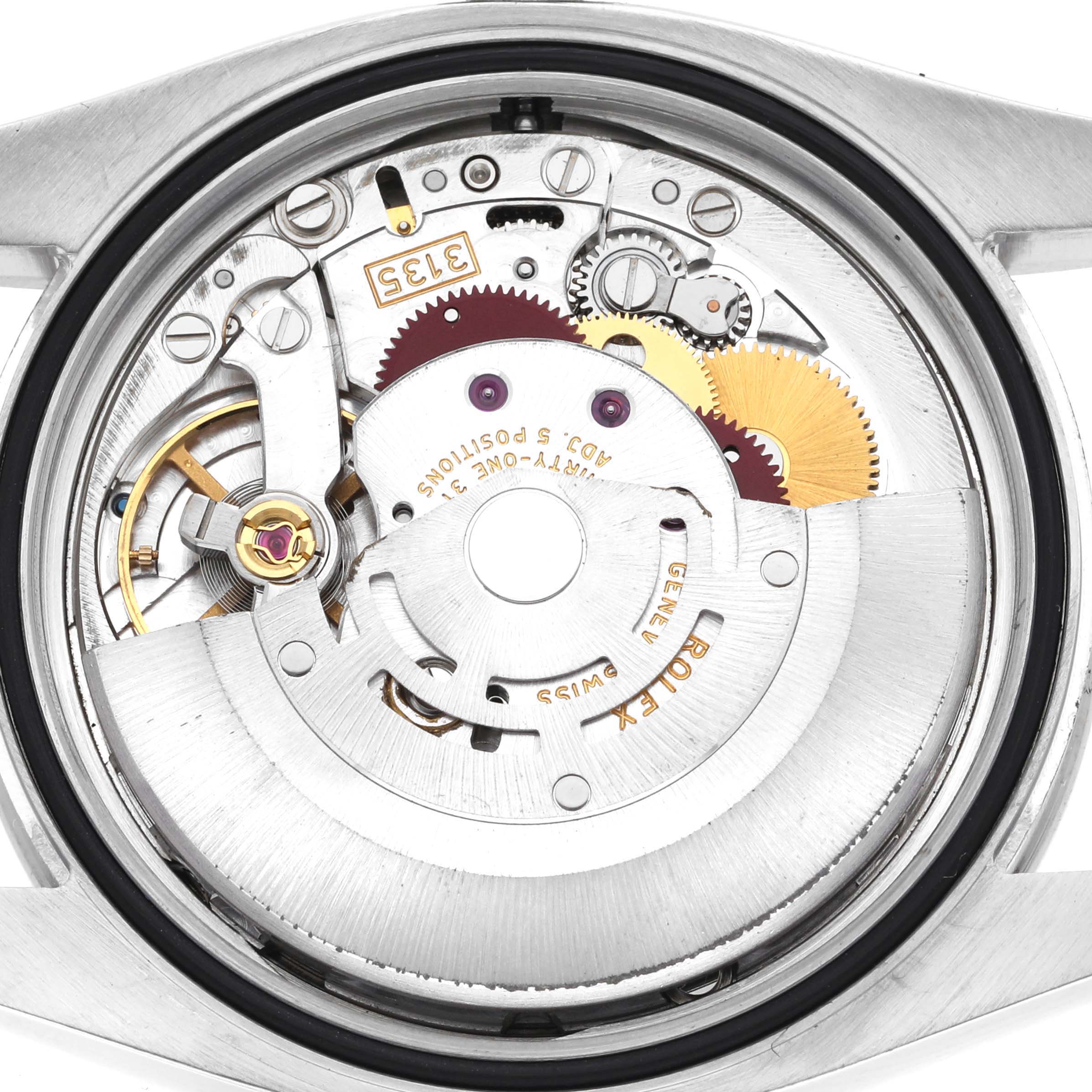The image shows the movement mechanism of a Rolex Datejust 116244 Men
s Stainless Steel Silver Dial 116244 Men
s Stainless Steel Silver Dial from a top-down angle.