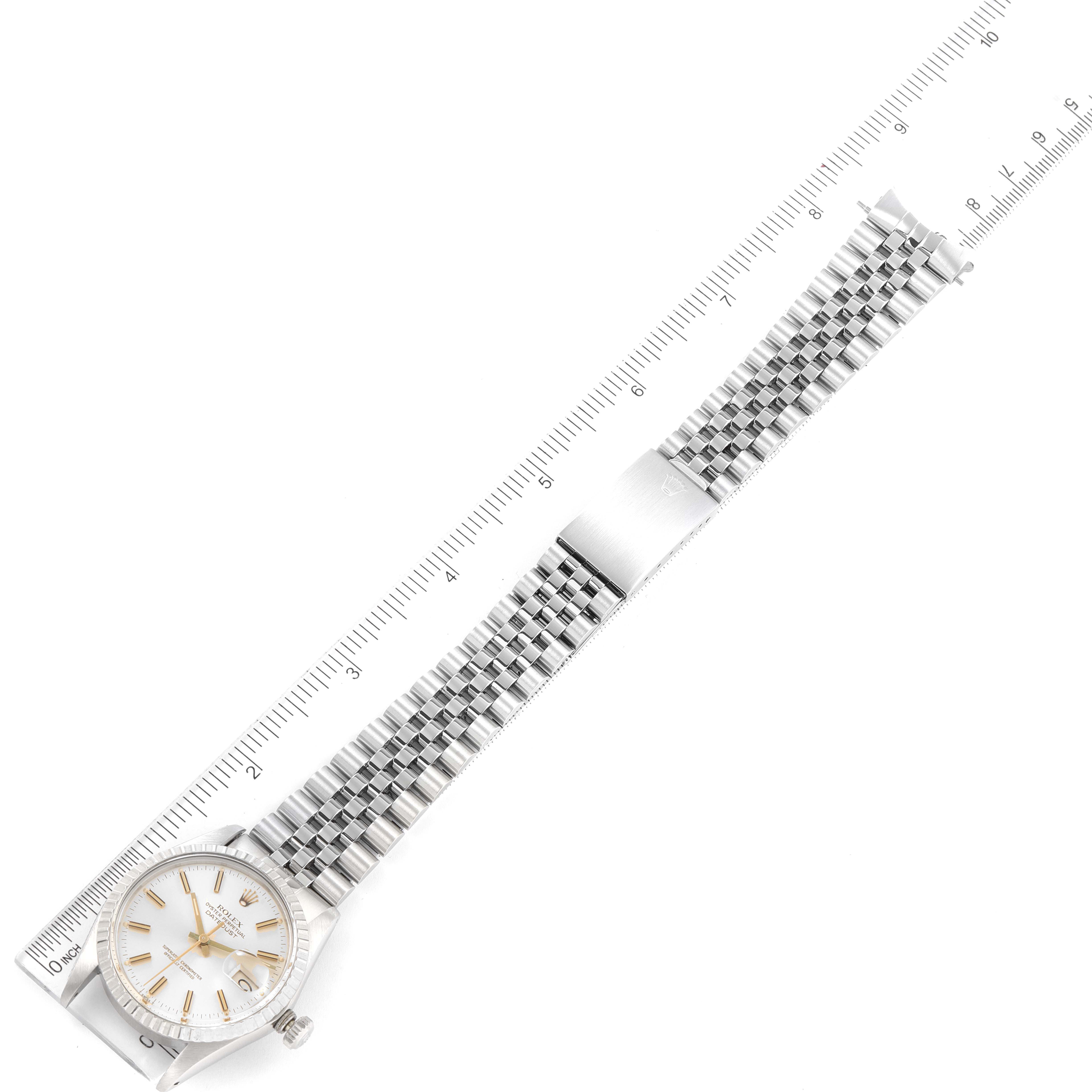 The image shows a full view of a Rolex Vintage Collection 16030 Men's Stainless Steel Silver Dial 16030 Men's Stainless Steel Silver Dial model watch, including the face, bezel, bracelet, and clasp, all laid next to a ruler.