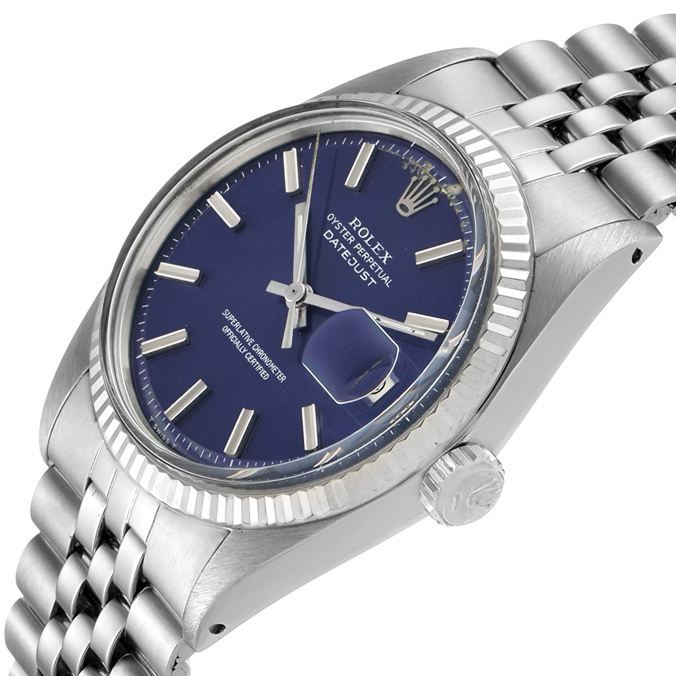 The image shows a Rolex Vintage Collection 1601 Men's Stainless Steel Blue Dial 1601 Men's Stainless Steel Blue Dial Datejust watch, angled to display the dial, bezel, crown, and bracelet.