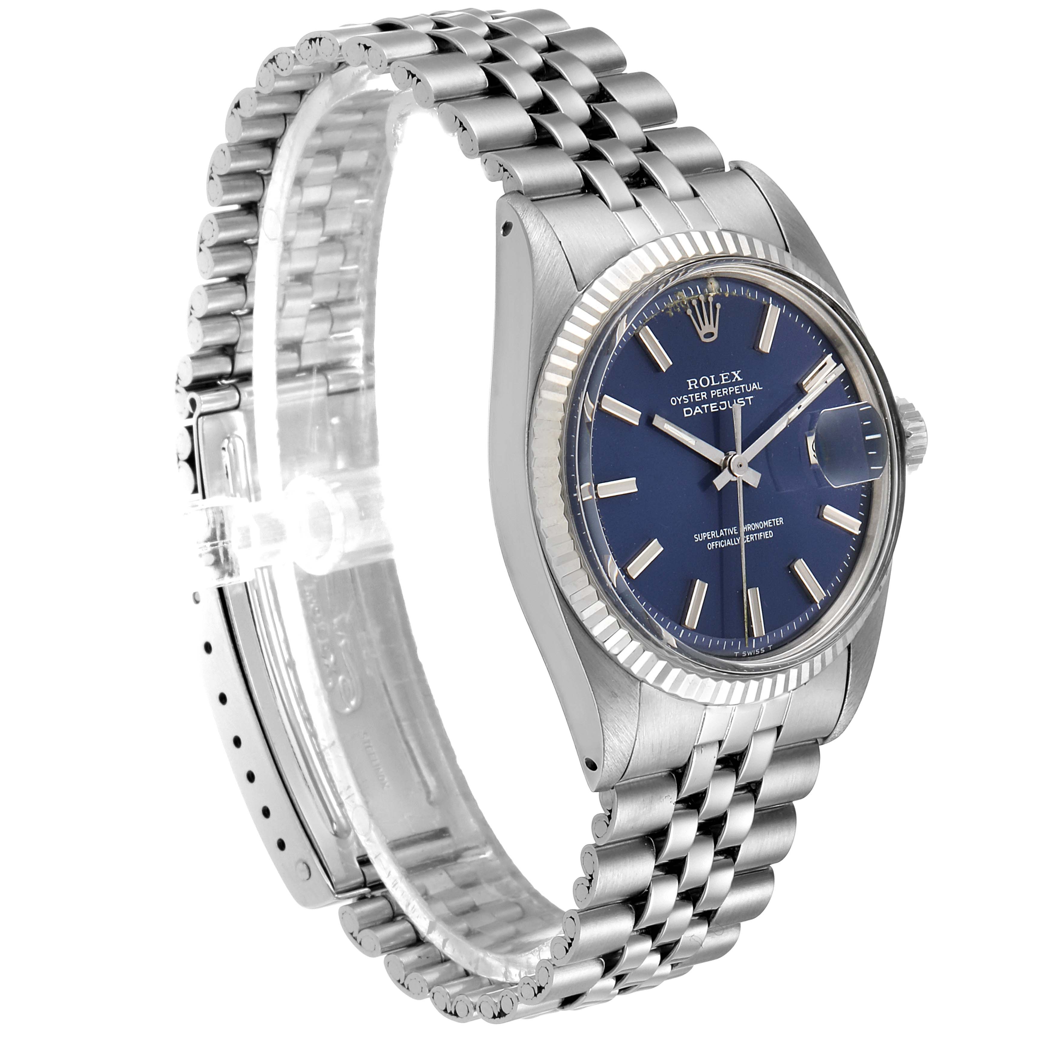 This image shows a Rolex Vintage Collection 1601 Men's Stainless Steel Blue Dial 1601 Men's Stainless Steel Blue Dial watch at a 3/4 angle, highlighting its blue dial, stainless steel case, and Jubilee bracelet.
