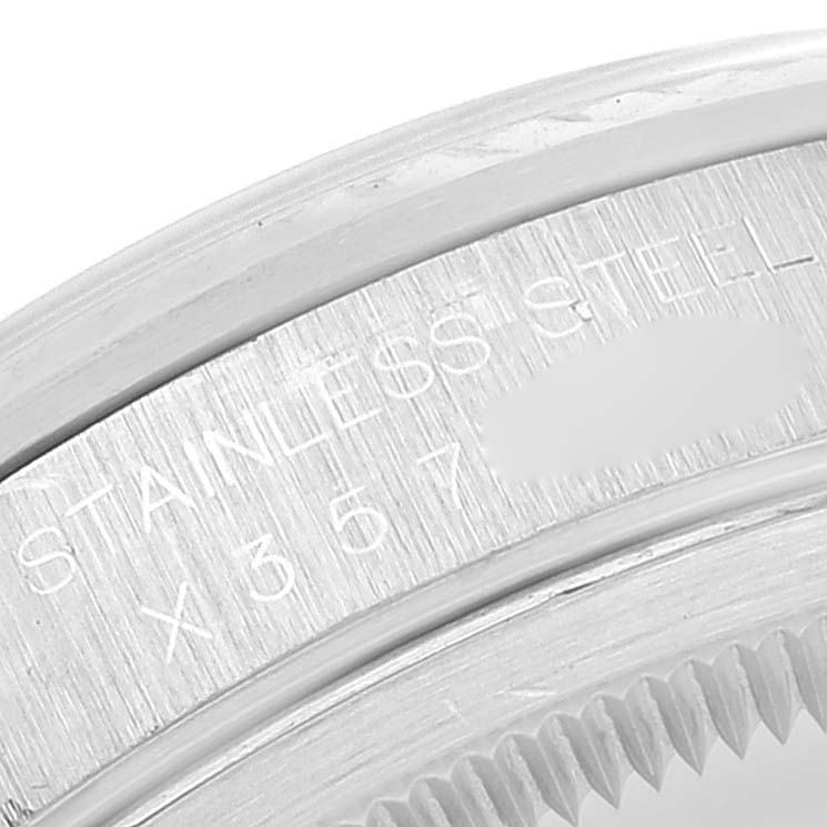 This close-up image shows the stainless steel case and part of the bezel of a Rolex Datejust 16234 Men's Stainless Steel Pink Dial 16234 Men's Stainless Steel Pink Dial watch.