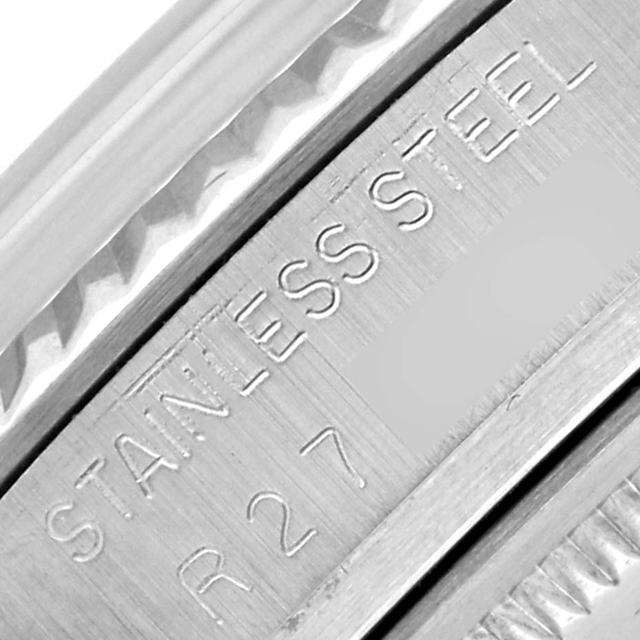 The image shows a close-up of the inner bezel with engraving details of the Rolex Datejust 16014 Men
s Stainless Steel Silver Dial 16014 Men
s Stainless Steel Silver Dial model.