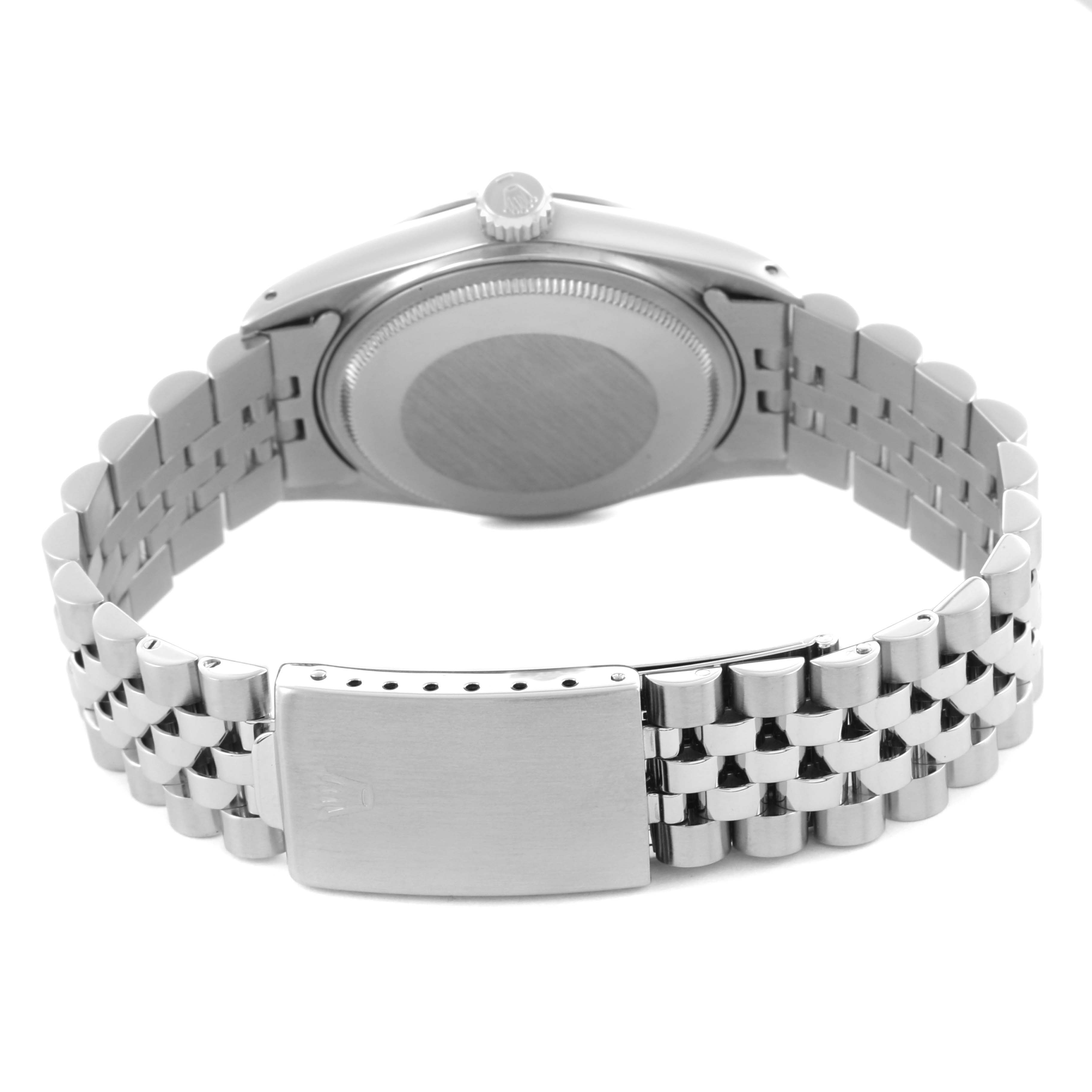 The image shows the back of a Rolex Datejust 16014 Men
s Stainless Steel Silver Dial 16014 Men
s Stainless Steel Silver Dial watch, highlighting the bracelet and case back.