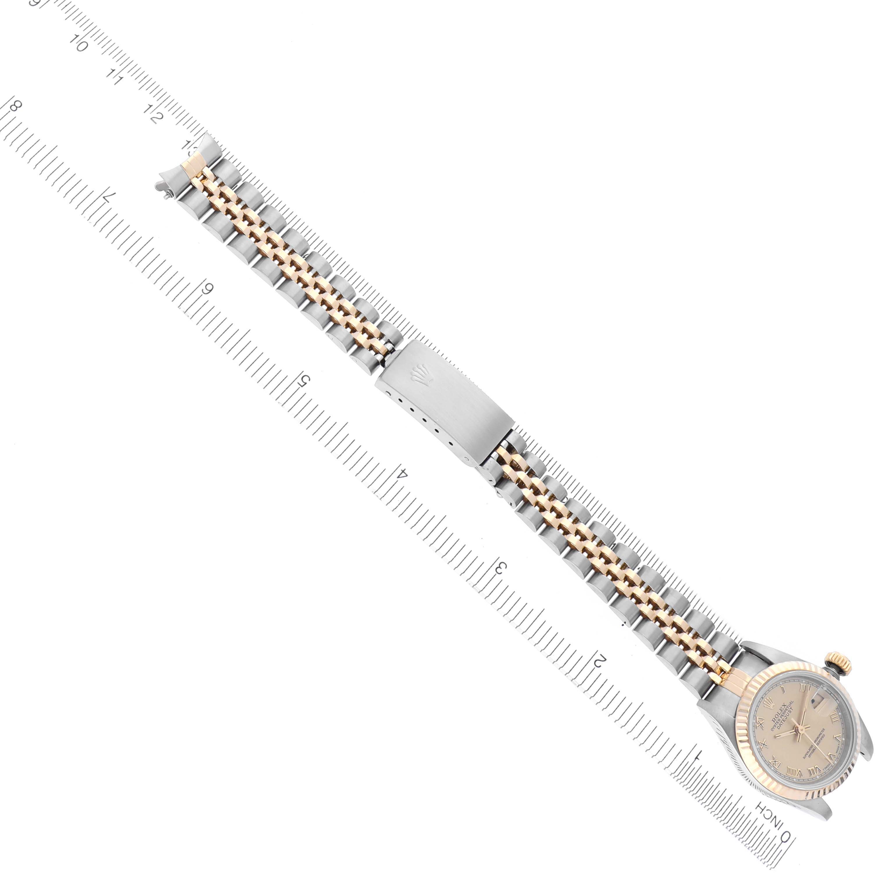 The image shows a side-on view of a Rolex Datejust 69173 Women's Steel and Gold (two tone) Champagne Dial 69173 Women's Steel and Gold (two tone) Champagne Dial watch, highlighting the bracelet, clasp, and part of the dial.