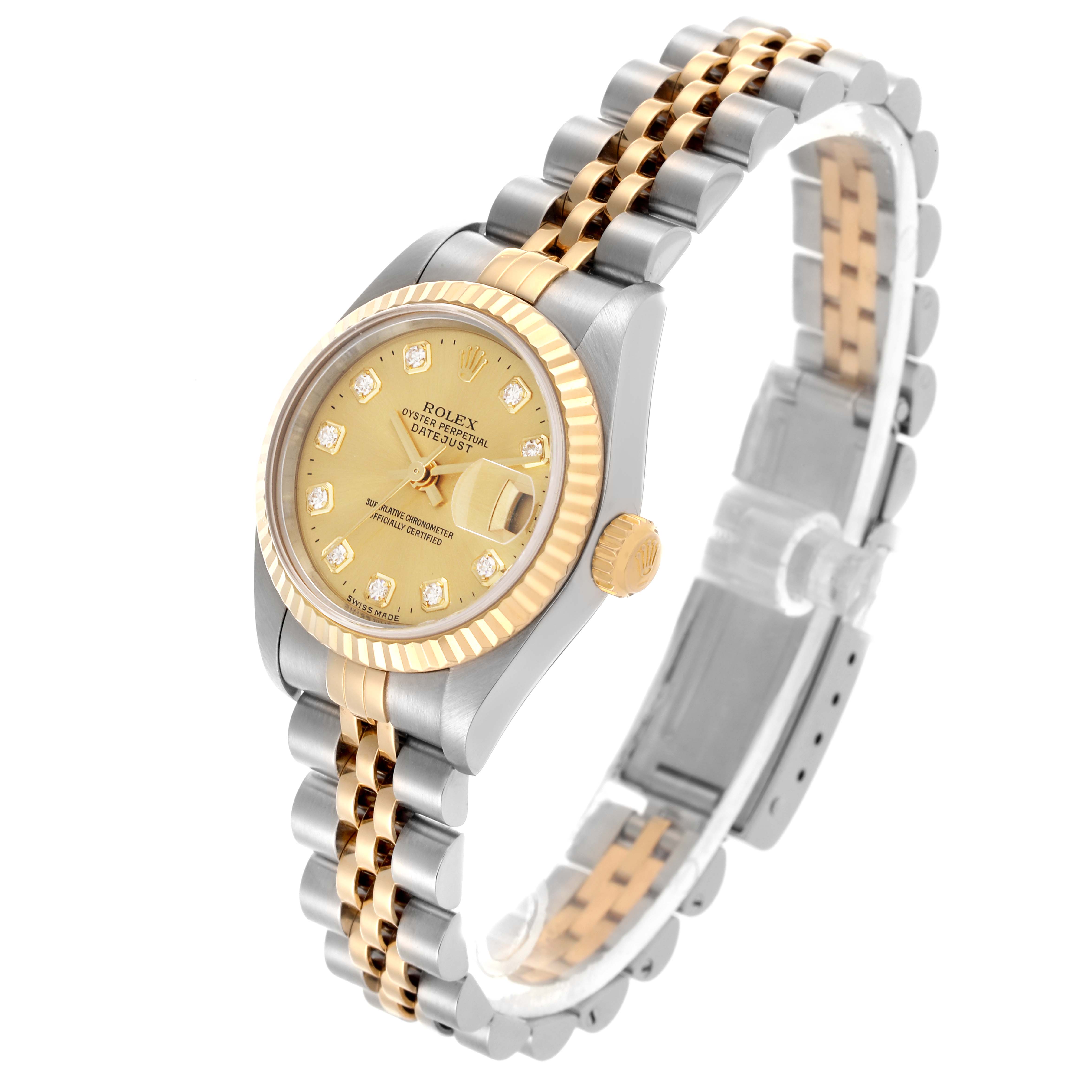 The Rolex Datejust 79173 Women's Steel and Gold (two tone) Champagne Dial 79173 Women's Steel and Gold (two tone) Champagne Dial watch is shown at a three-quarter angle, highlighting the face, fluted bezel, crown, and Jubilee bracelet.