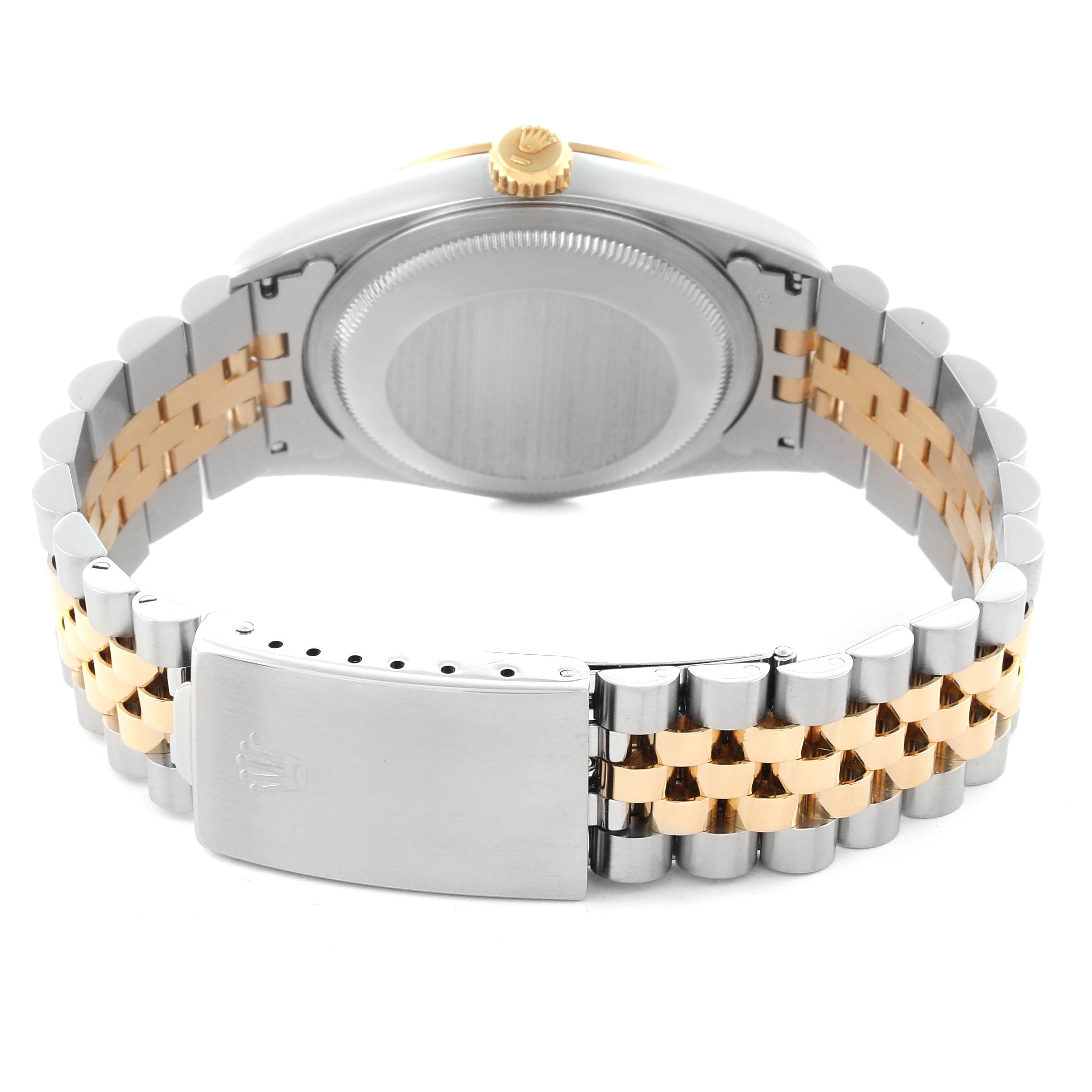 The image shows the back view of a Rolex Datejust 16233 Men's Steel and Gold (two tone) Champagne Dial 16233 Men's Steel and Gold (two tone) Champagne Dial watch, highlighting its clasp, bracelet, and case back.