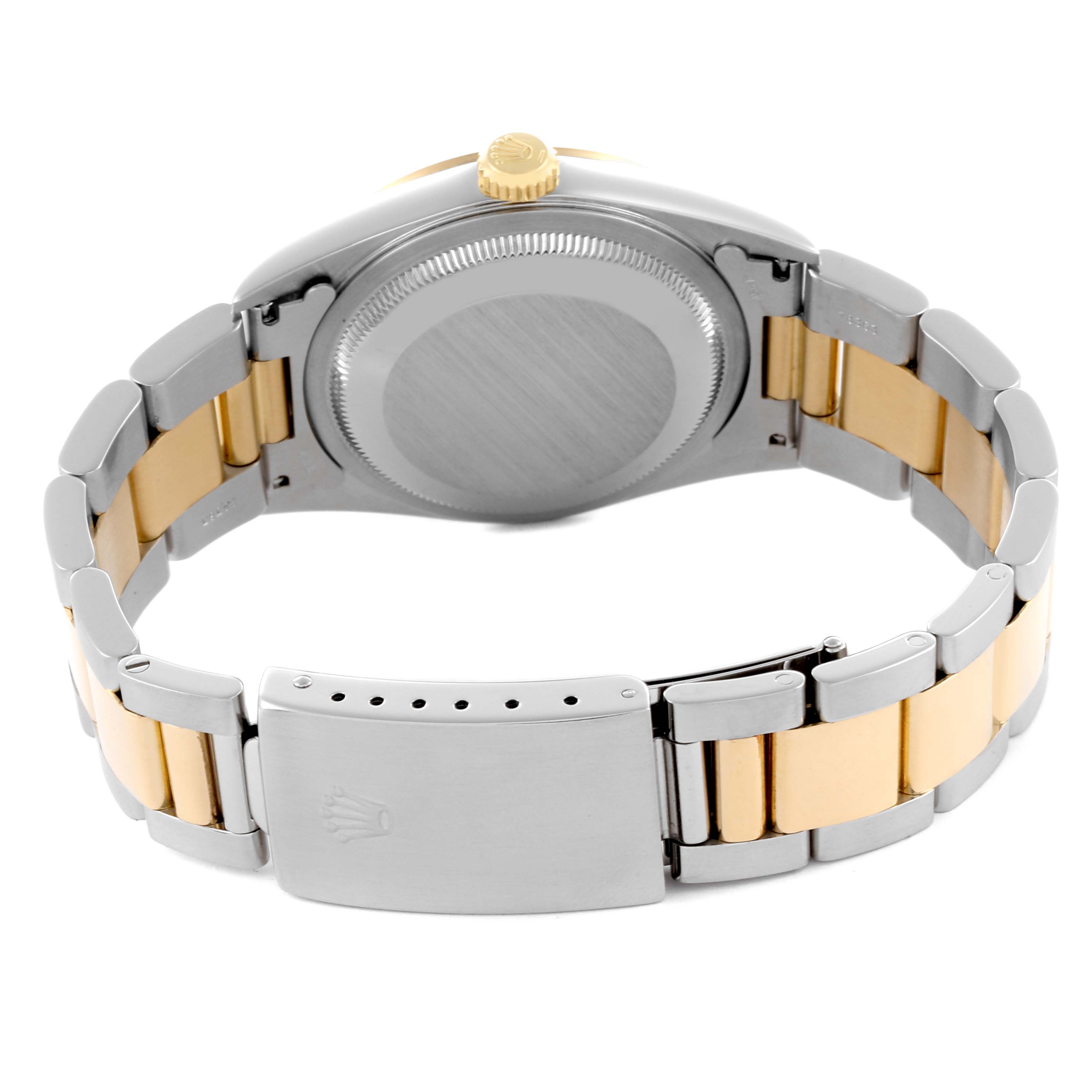 The Rolex Datejust 16203 Men's Steel and Gold (two tone) Mother of Pearl Dial 16203 Men's Steel and Gold (two tone) Mother of Pearl Dial watch is shown from the back, featuring the clasp, bracelet, and case back.