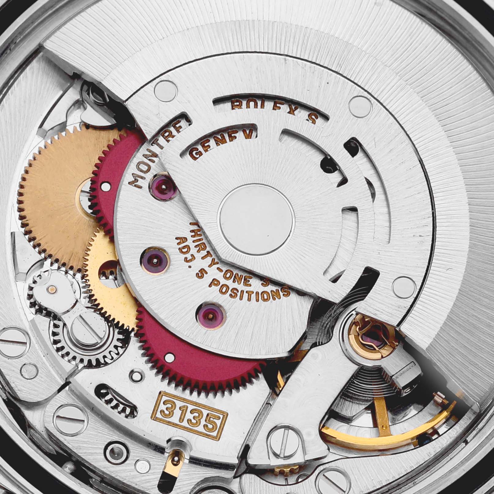 The image shows the inner mechanical movement of a Rolex Datejust 16203 Men's Steel and Gold (two tone) Mother of Pearl Dial 16203 Men's Steel and Gold (two tone) Mother of Pearl Dial watch, highlighting gears and the rotor from a top-down angle.