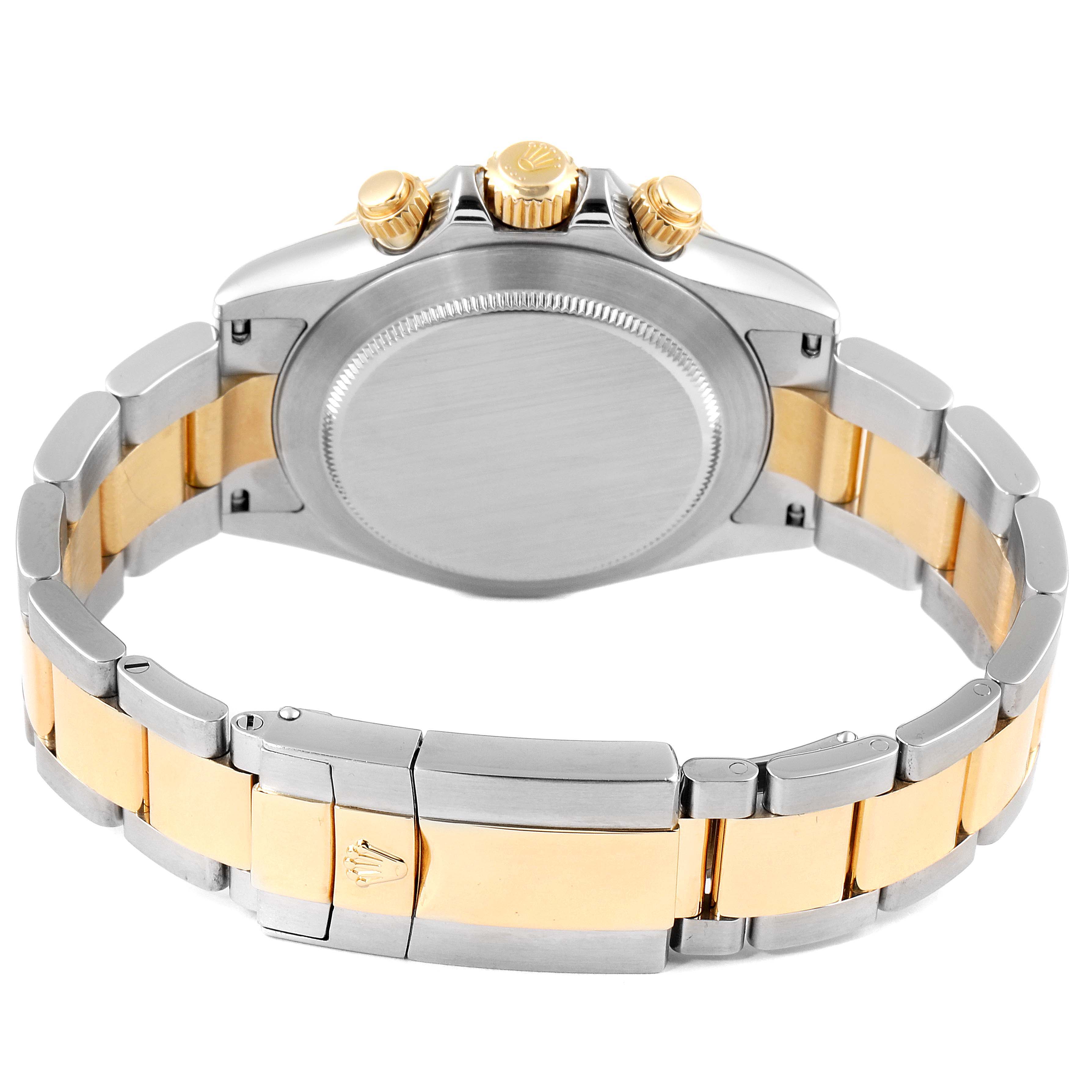 This image shows the back view of a Rolex Daytona 116523 Men's Steel and Gold (two tone) Mother of Pearl Dial 116523 Men's Steel and Gold (two tone) Mother of Pearl Dial watch, highlighting the bracelet, clasp, and crown.