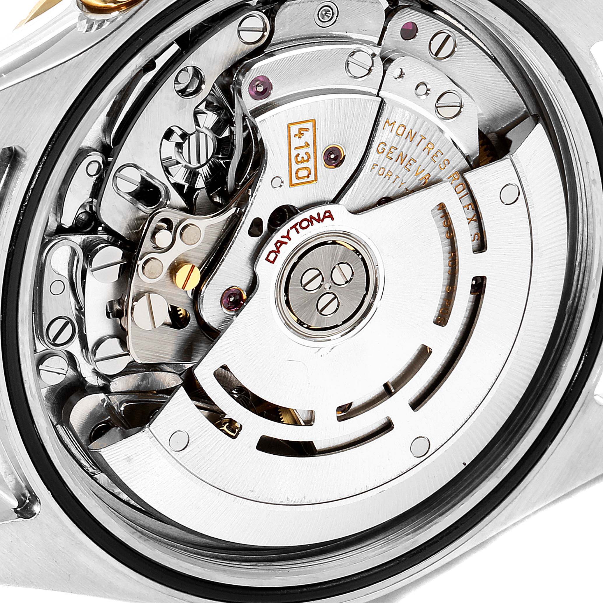 This image shows a close-up view of the movement inside a Rolex Daytona 116523 Men's Steel and Gold (two tone) Mother of Pearl Dial 116523 Men's Steel and Gold (two tone) Mother of Pearl Dial watch.