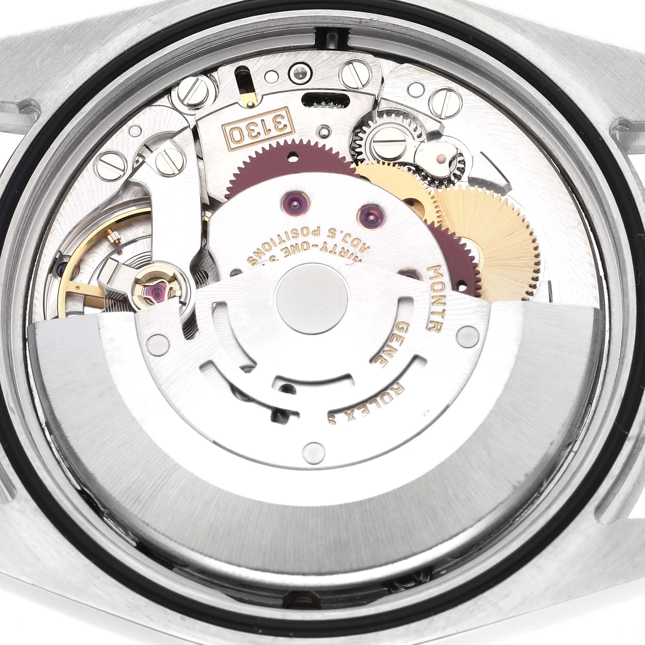 The image shows the inner mechanism of a Rolex Explorer 114270 Men
s Stainless Steel Black Dial 114270 Men
s Stainless Steel Black Dial watch from a top-down angle, highlighting gears and components.