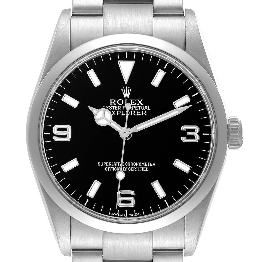 The Rolex Explorer watch is shown from the front, highlighting the black dial, hour markers, hands, bezel, and part of the bracelet.